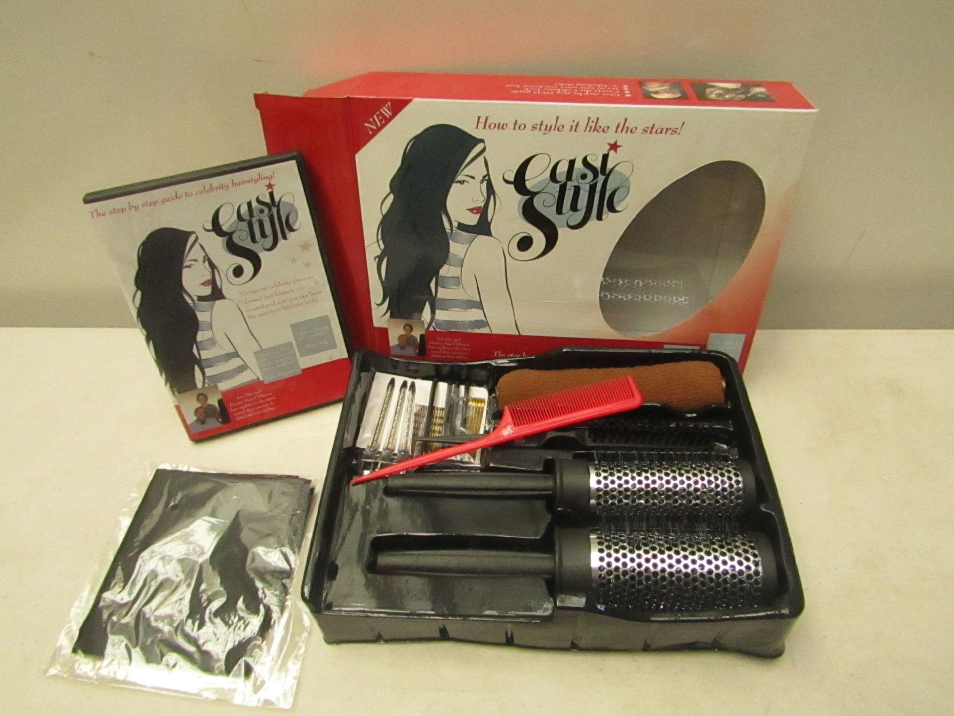 Easistyle hair styling set, new and boxed. Contains;  Celeb styling DVD, Large curling brush,