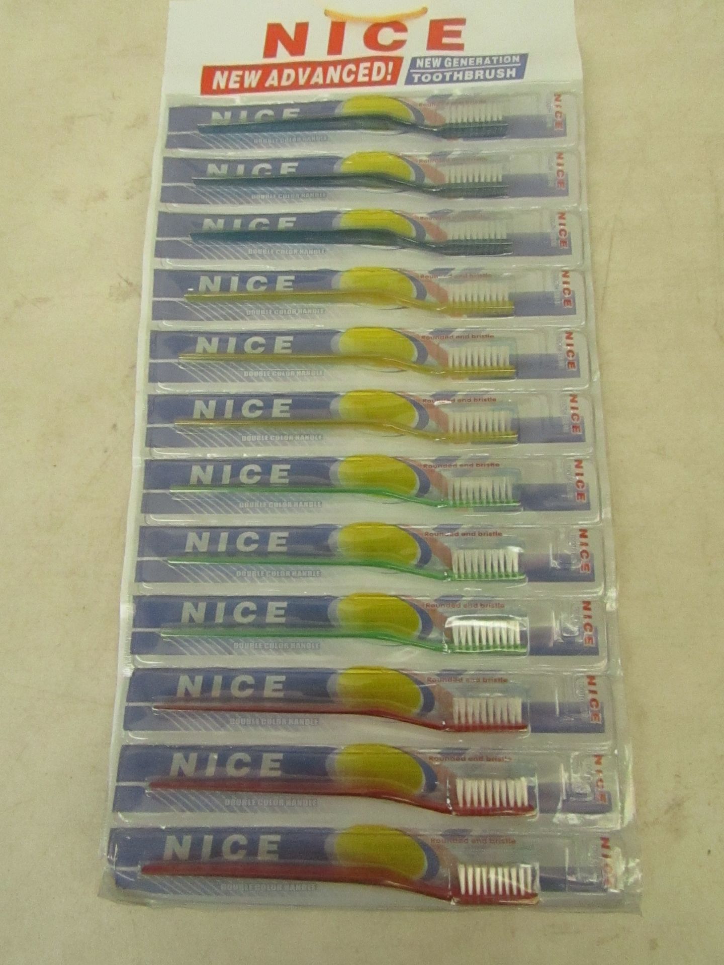 Approx 120x toothbrushes, new and factory sealed packaging.