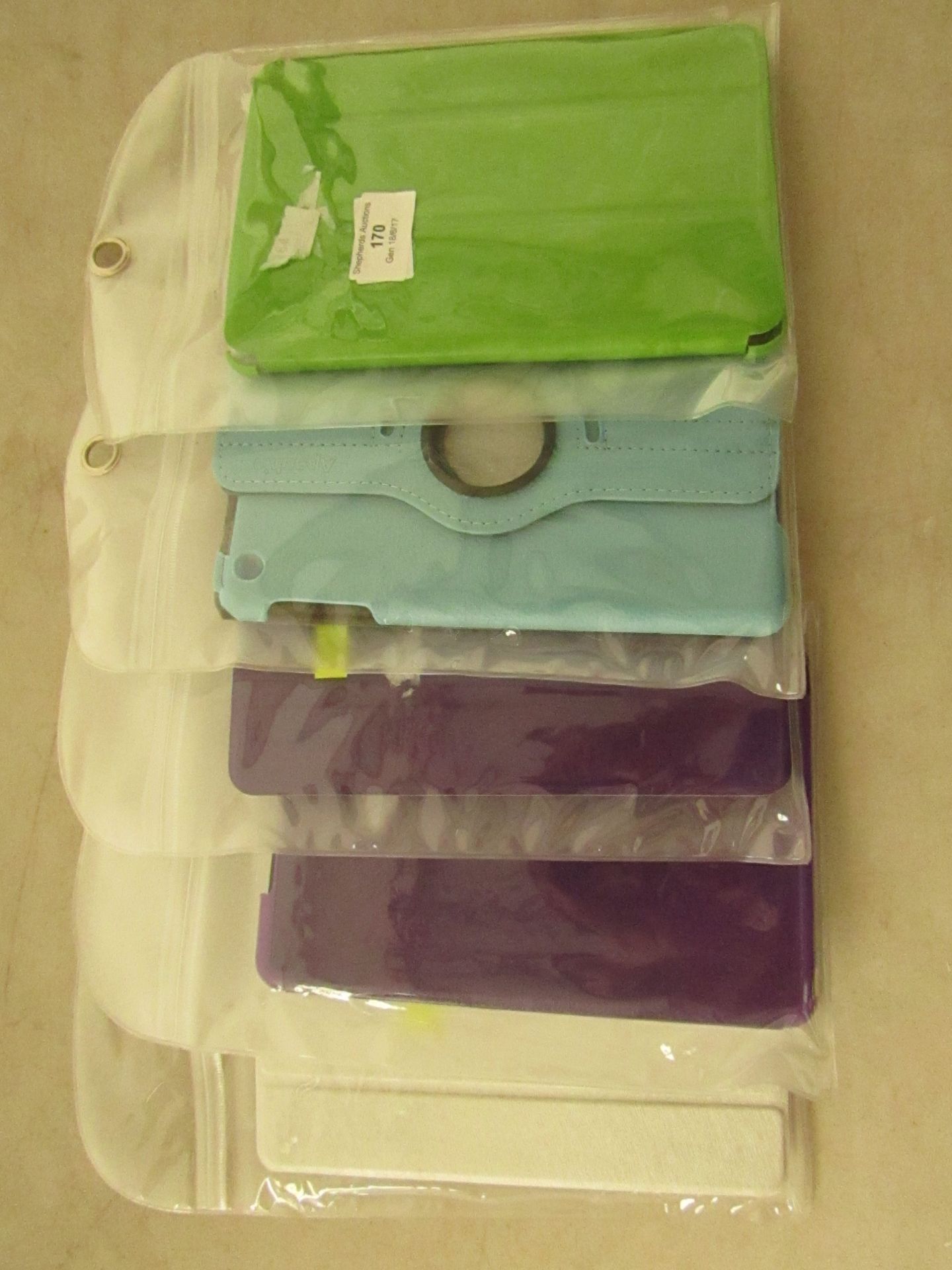 5x Various tablet cases. All new in packaging.