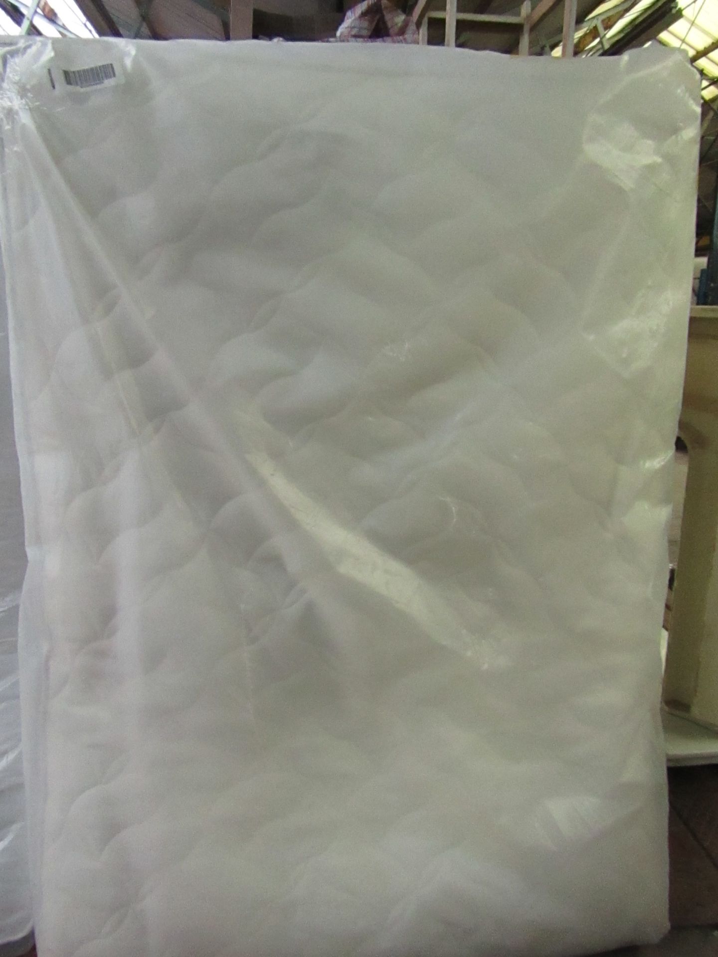 Double sized memory foam mattress 135 x 190, in packaging.