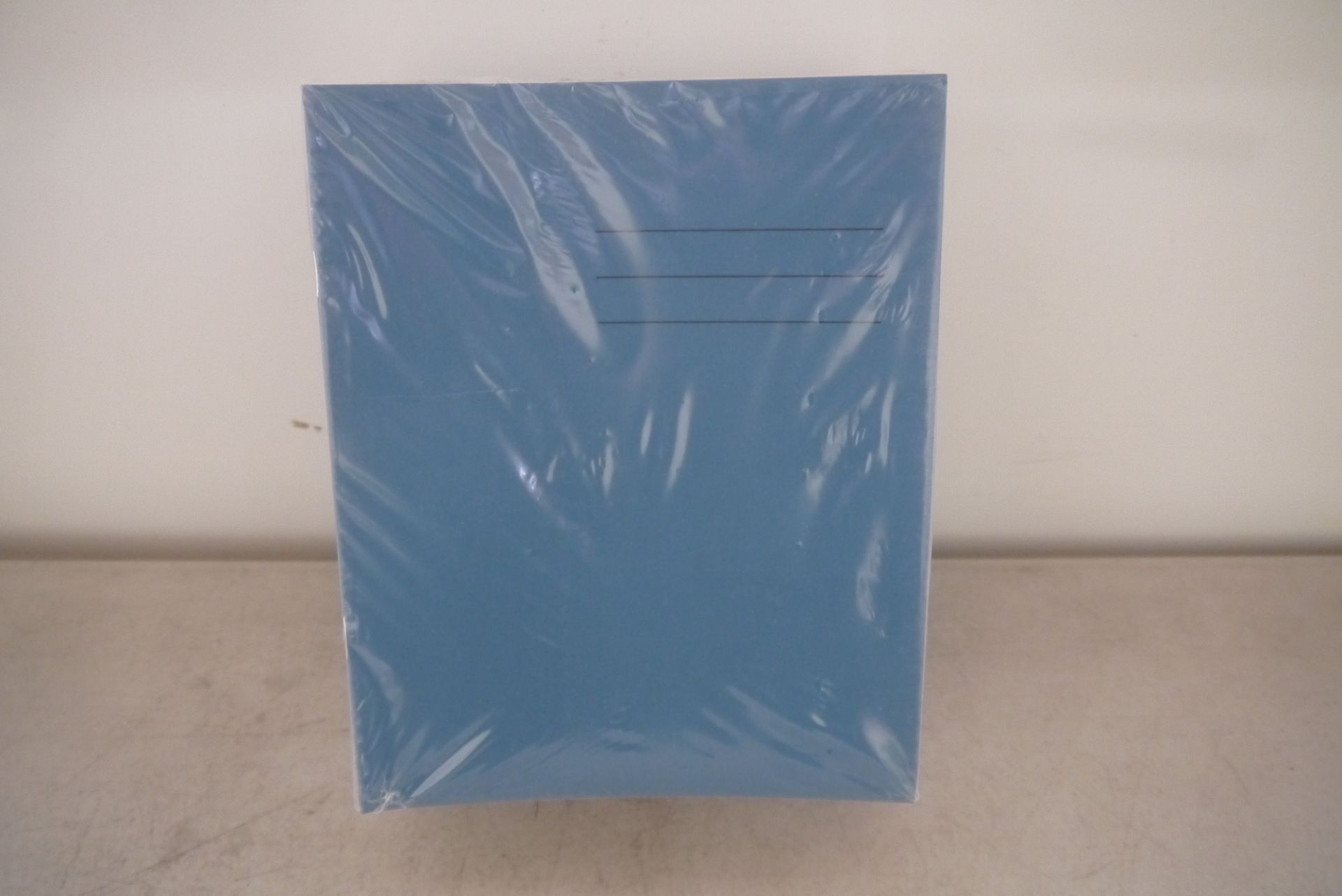 100 Pieces 8x6.5 5mm Square Light blue colour exercise books, brand new and boxed. RRP £16.99