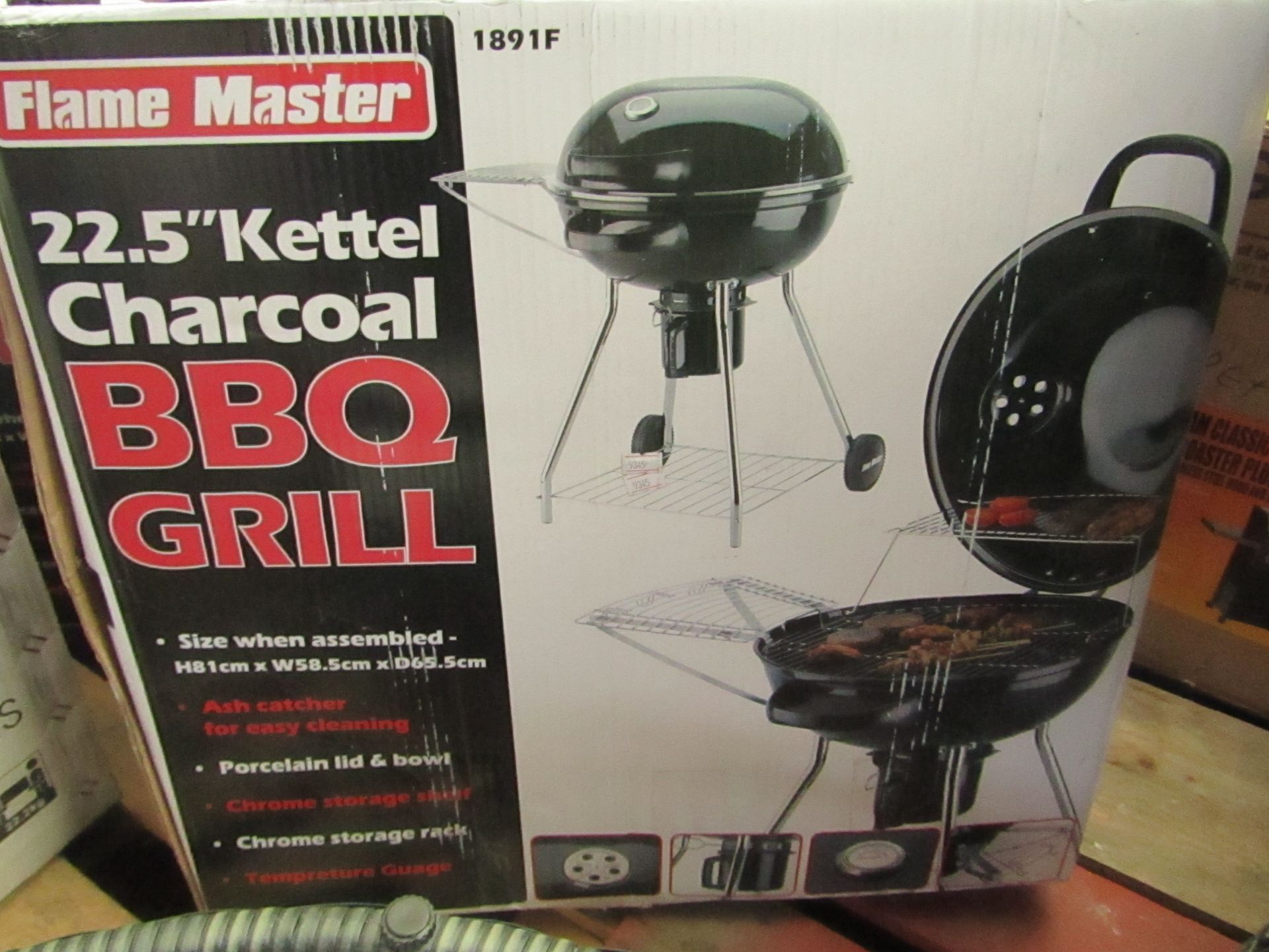 Flame master 22.5" kettel charcoal bbq grill, unchecked and boxed.