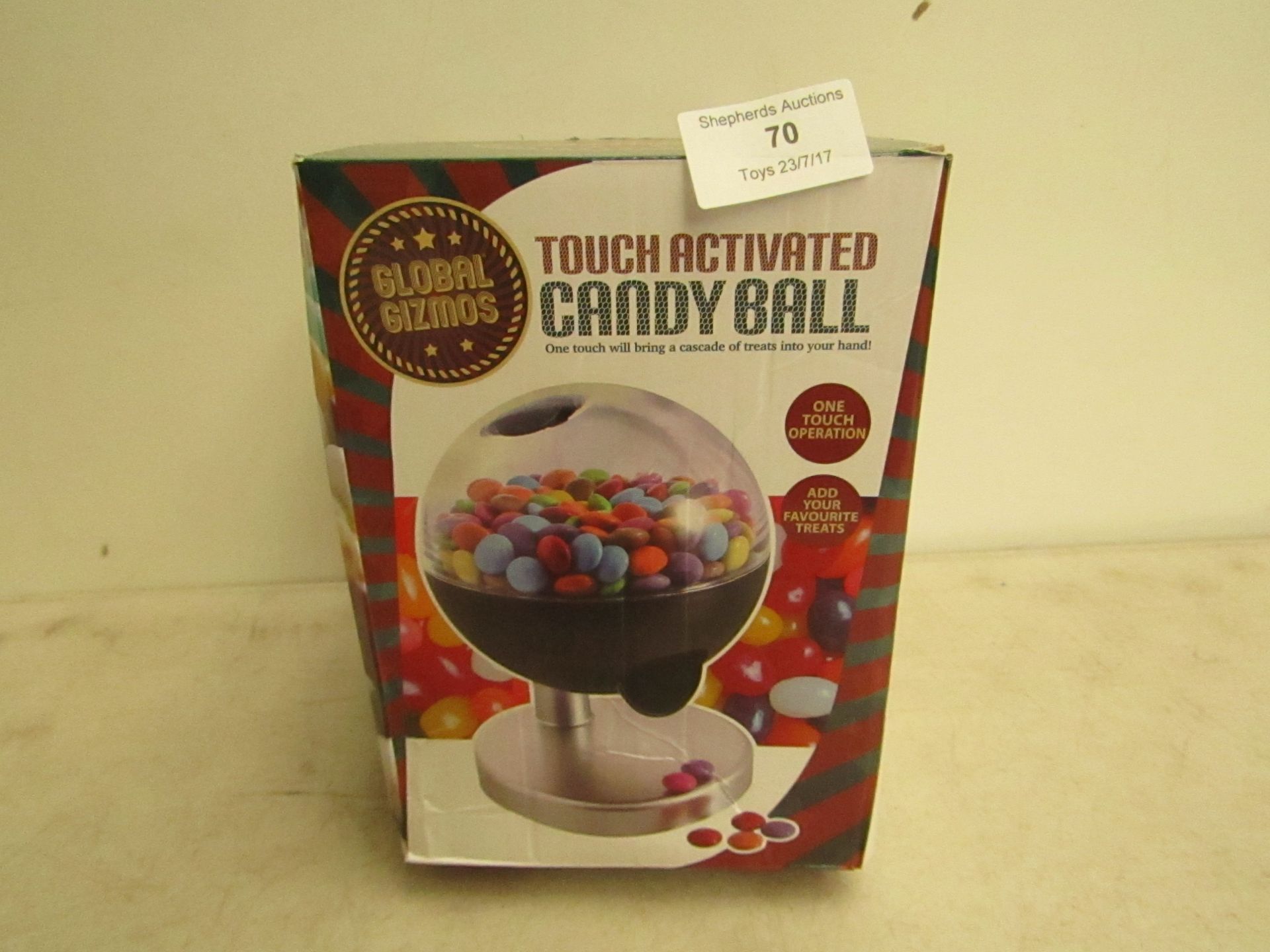 Touch activated candy ball, unchecked and boxed.