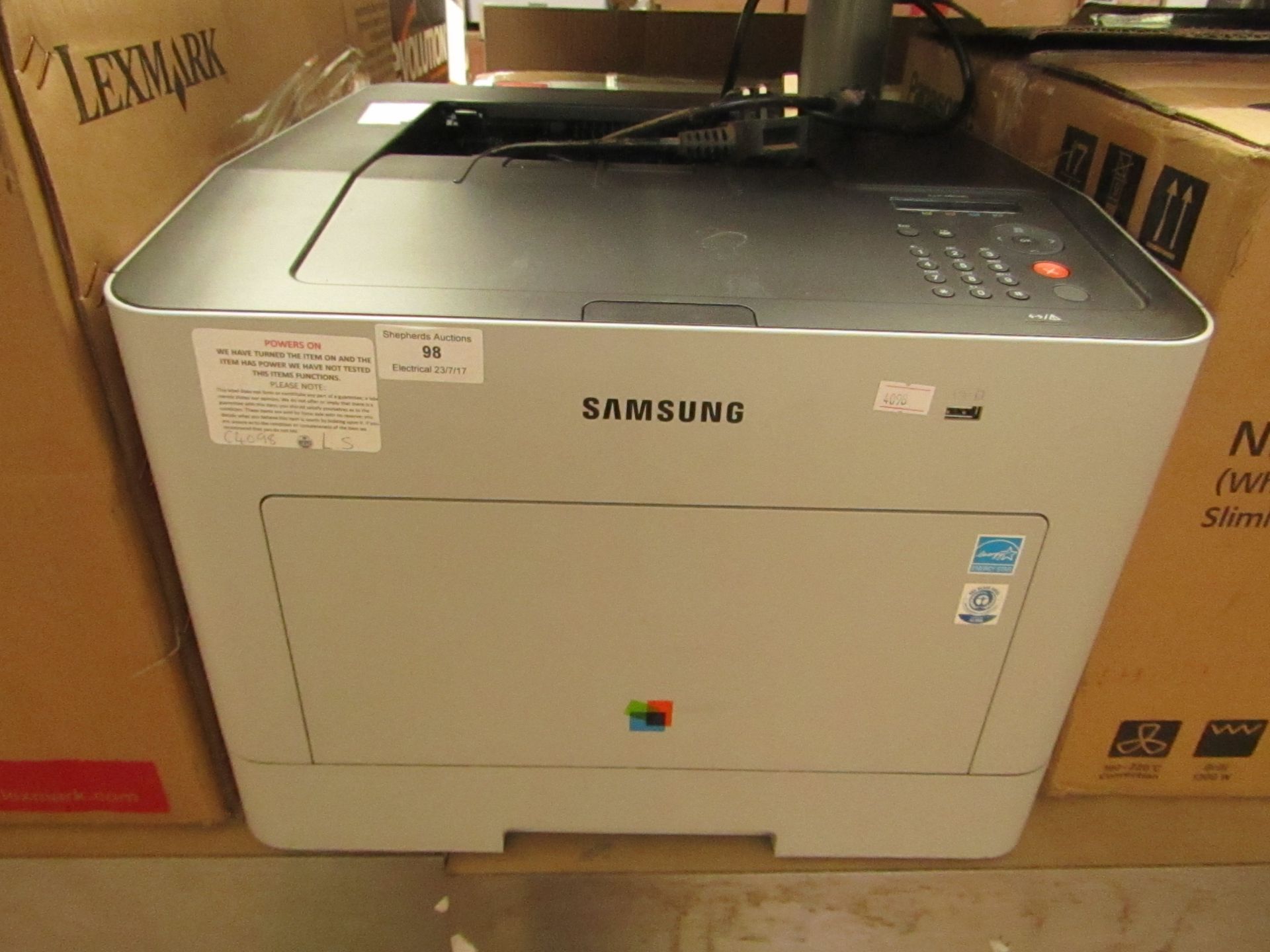 Samsung CLP-680ND A4 Colour Laser Printer. Powers on (we haven't tried to print anything). RRP'd