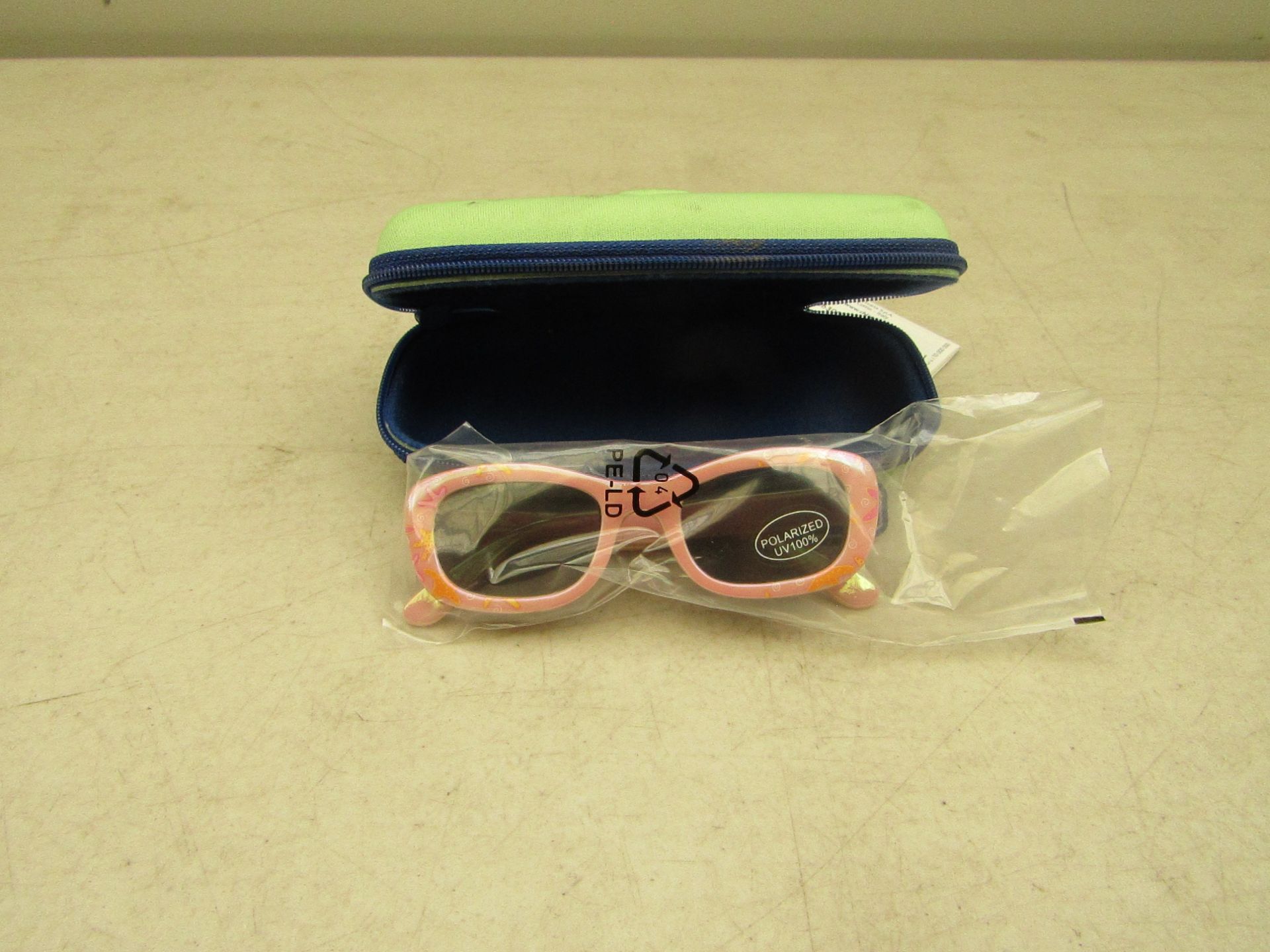 2x Chicco polarized UV 100% sunglasses, 24 months, both new in carry cases.