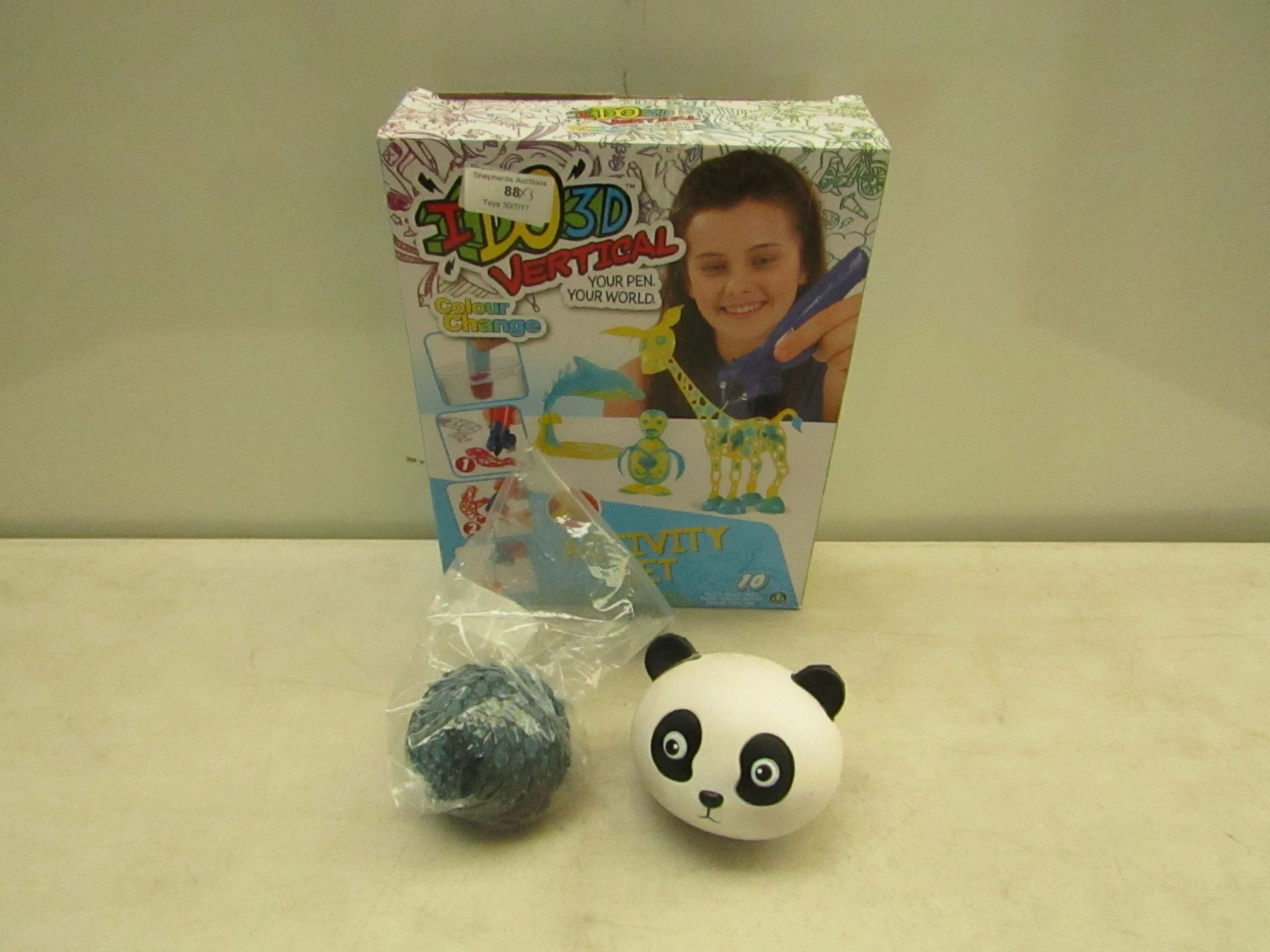 3 items being; I Do 3D vertical unchecked and boxed, Panda stress ball, squidgy ball, see picture