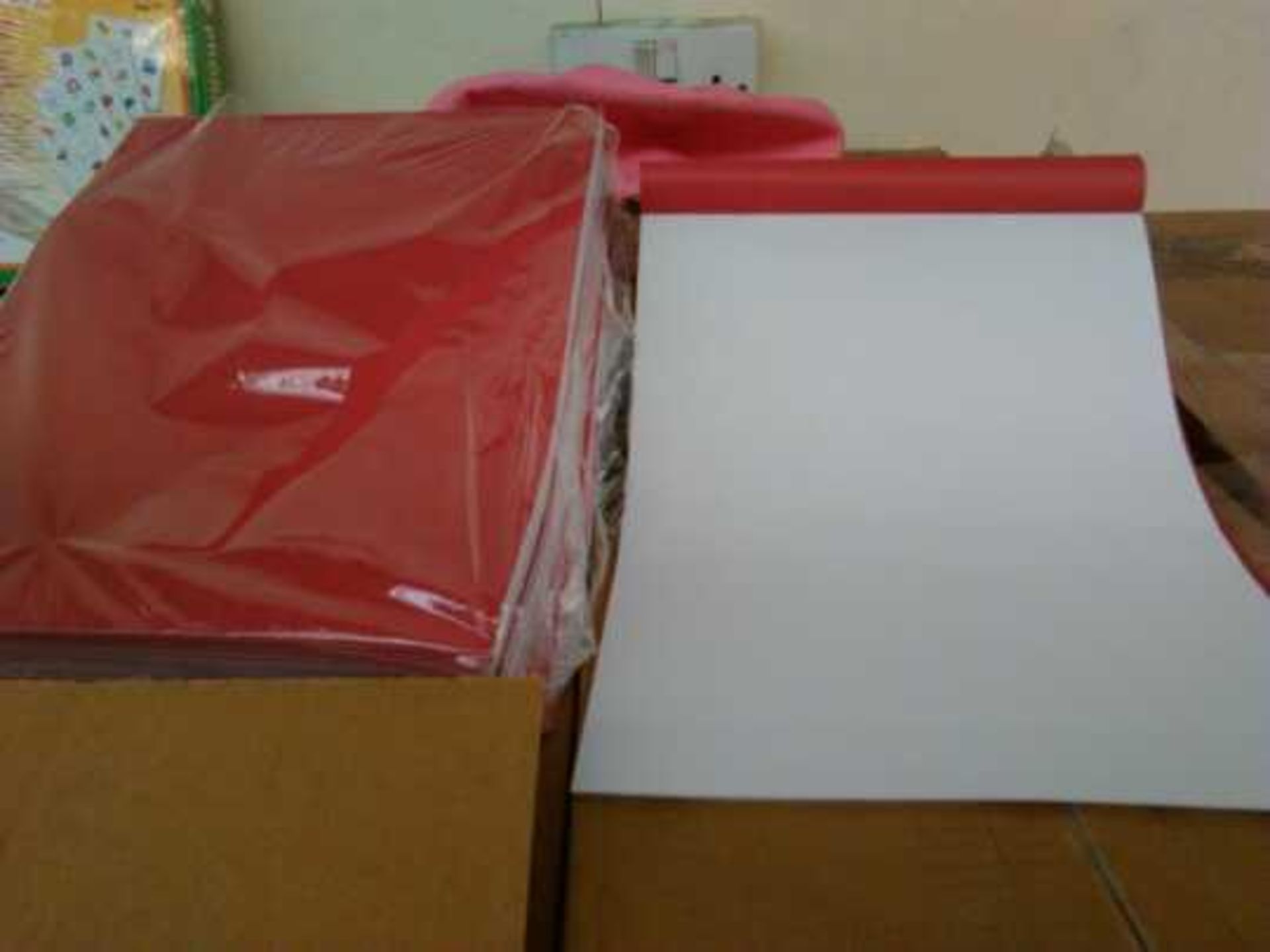 Box of 100x A4 landscape plain crayon red colour work books. New.
