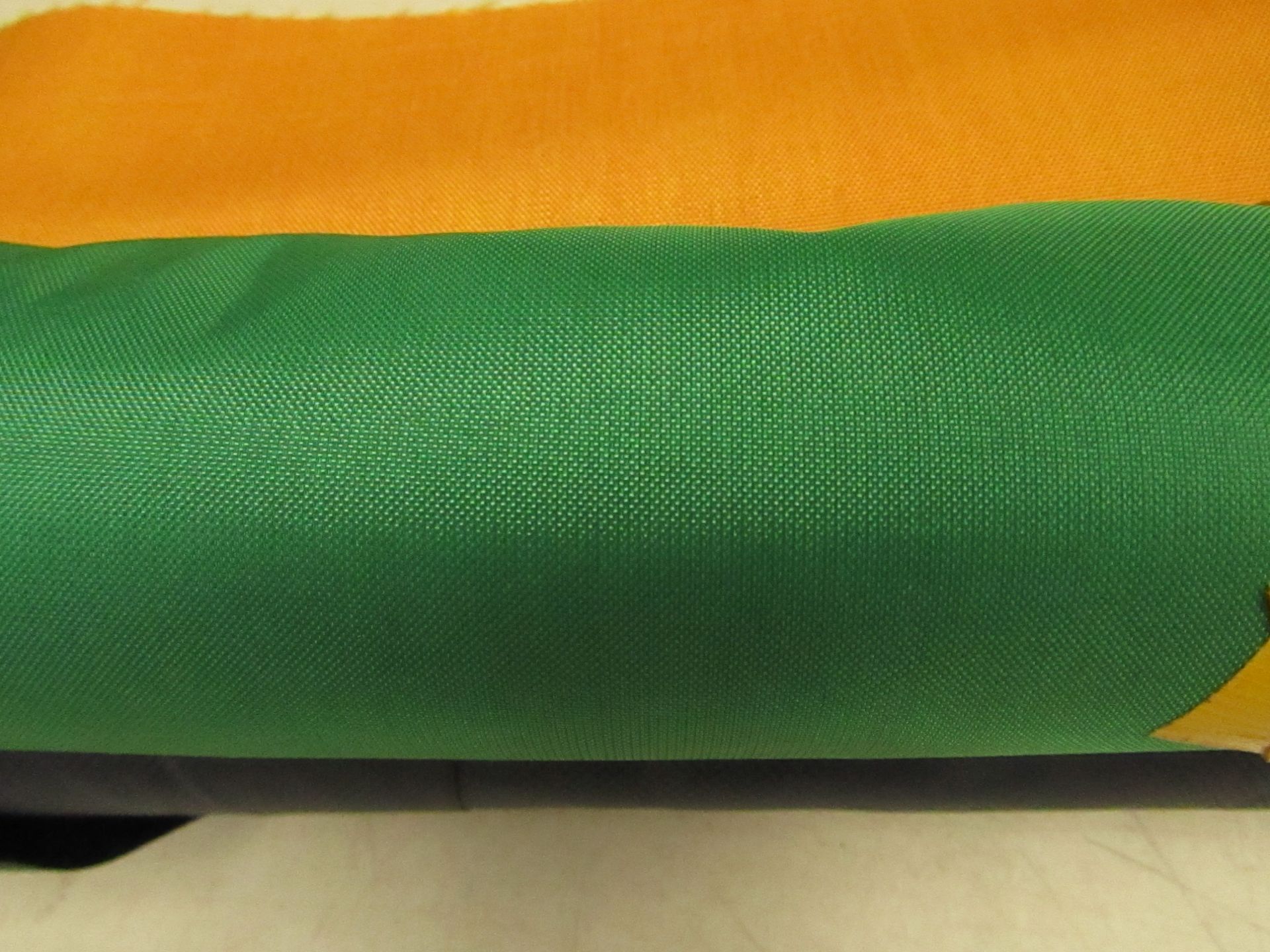 3x Rolls of Various coloured fabric in various lengths.