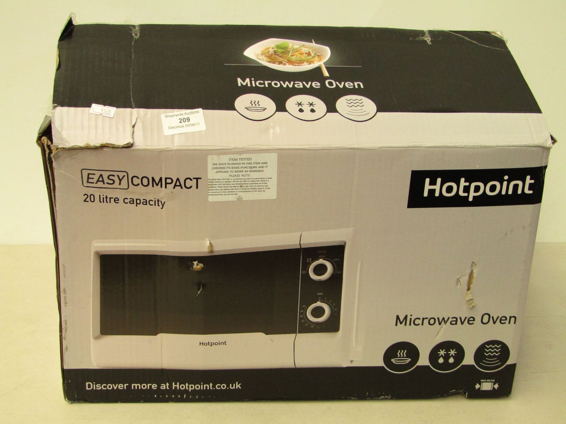 Hotpoint Easy Compact 20L microwave oven, tested working and boxed.