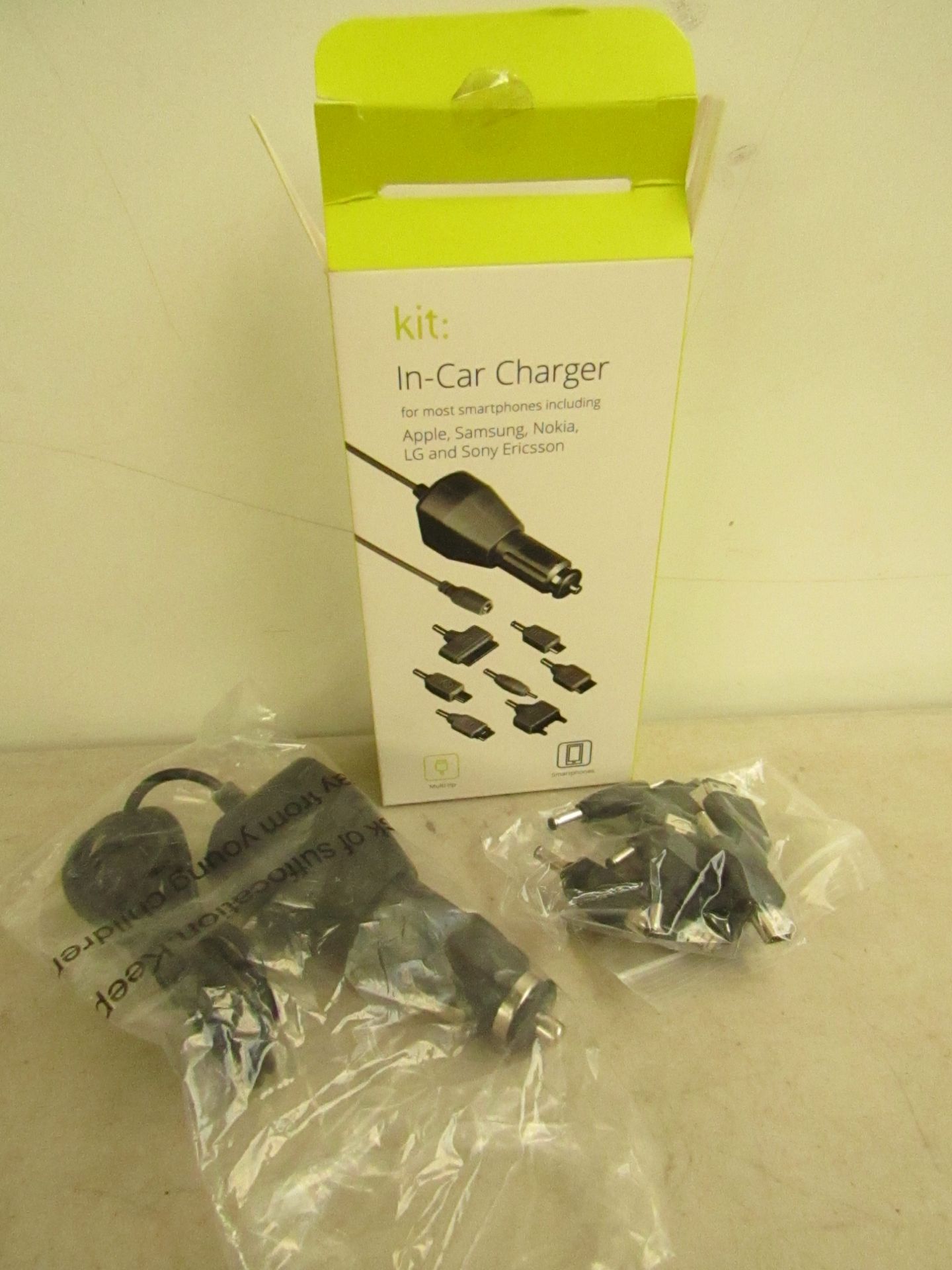 100x Kit in-car chargers, (universal) new and boxed.