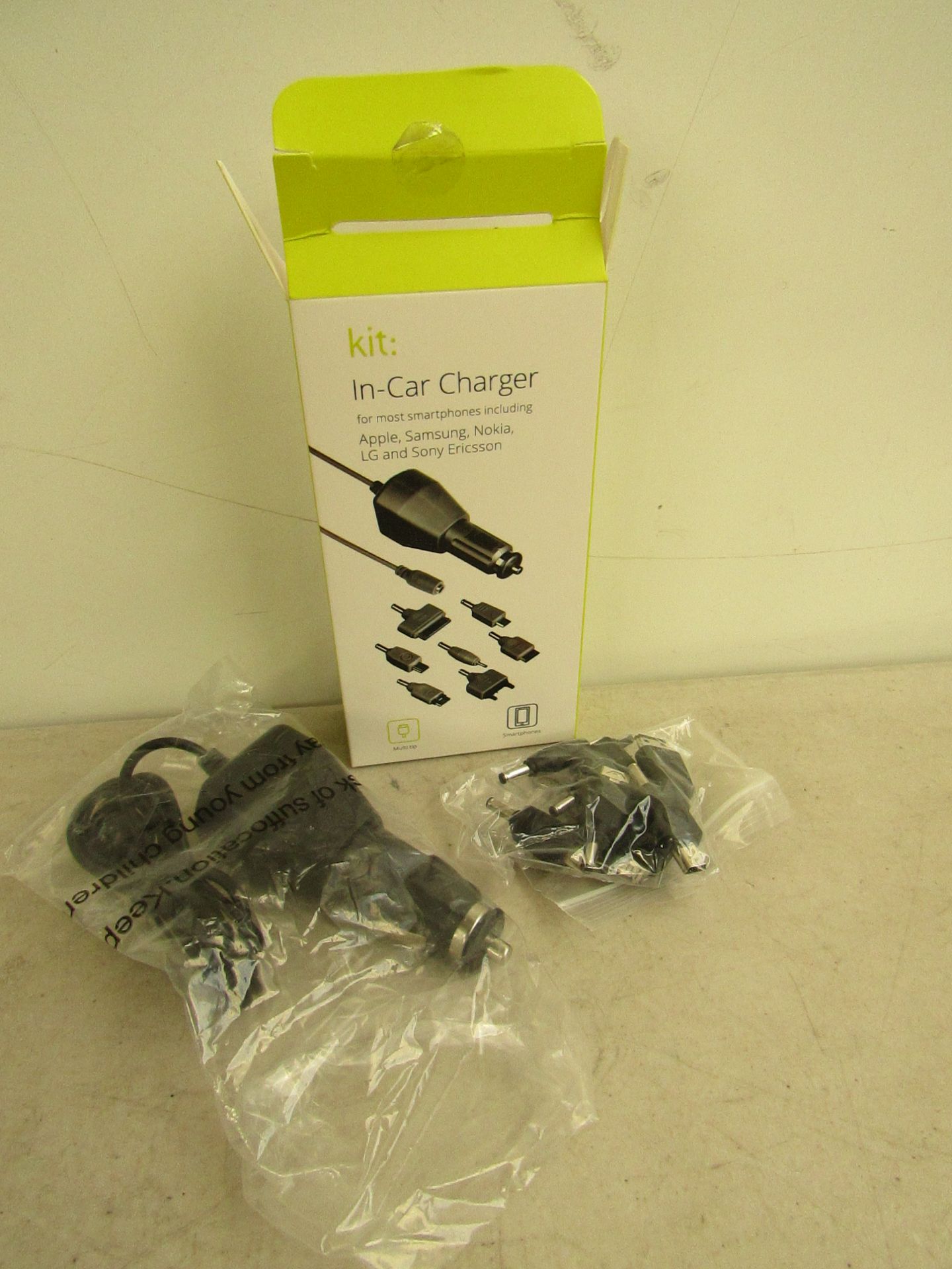 100x Kit in-car chargers, (universal) new and boxed.