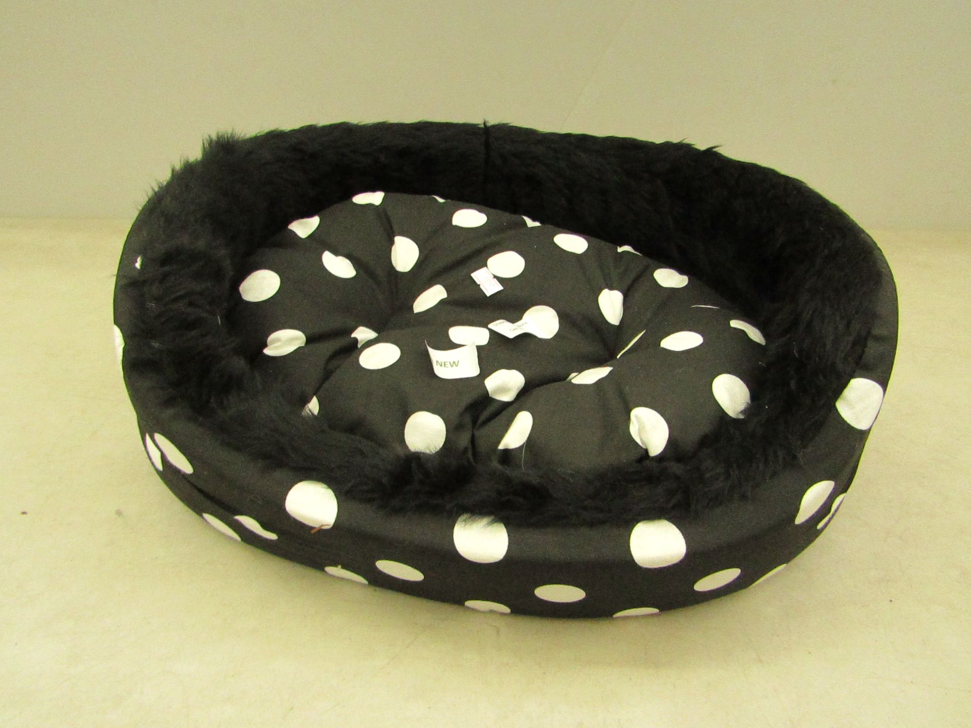 black with white polka dot design cat bed, new