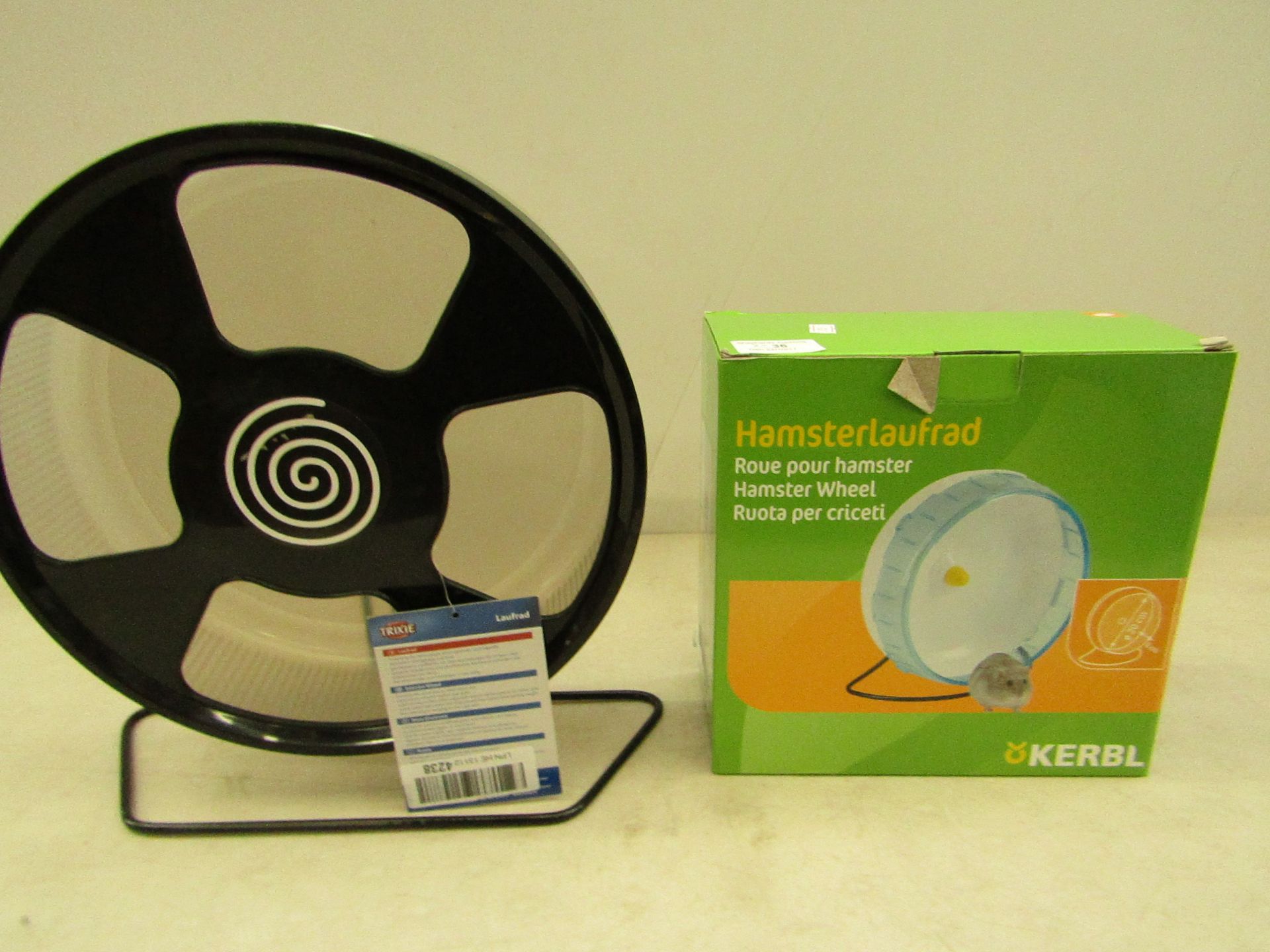 2x hamster wheel of various design, 1 is boxed and unchecked