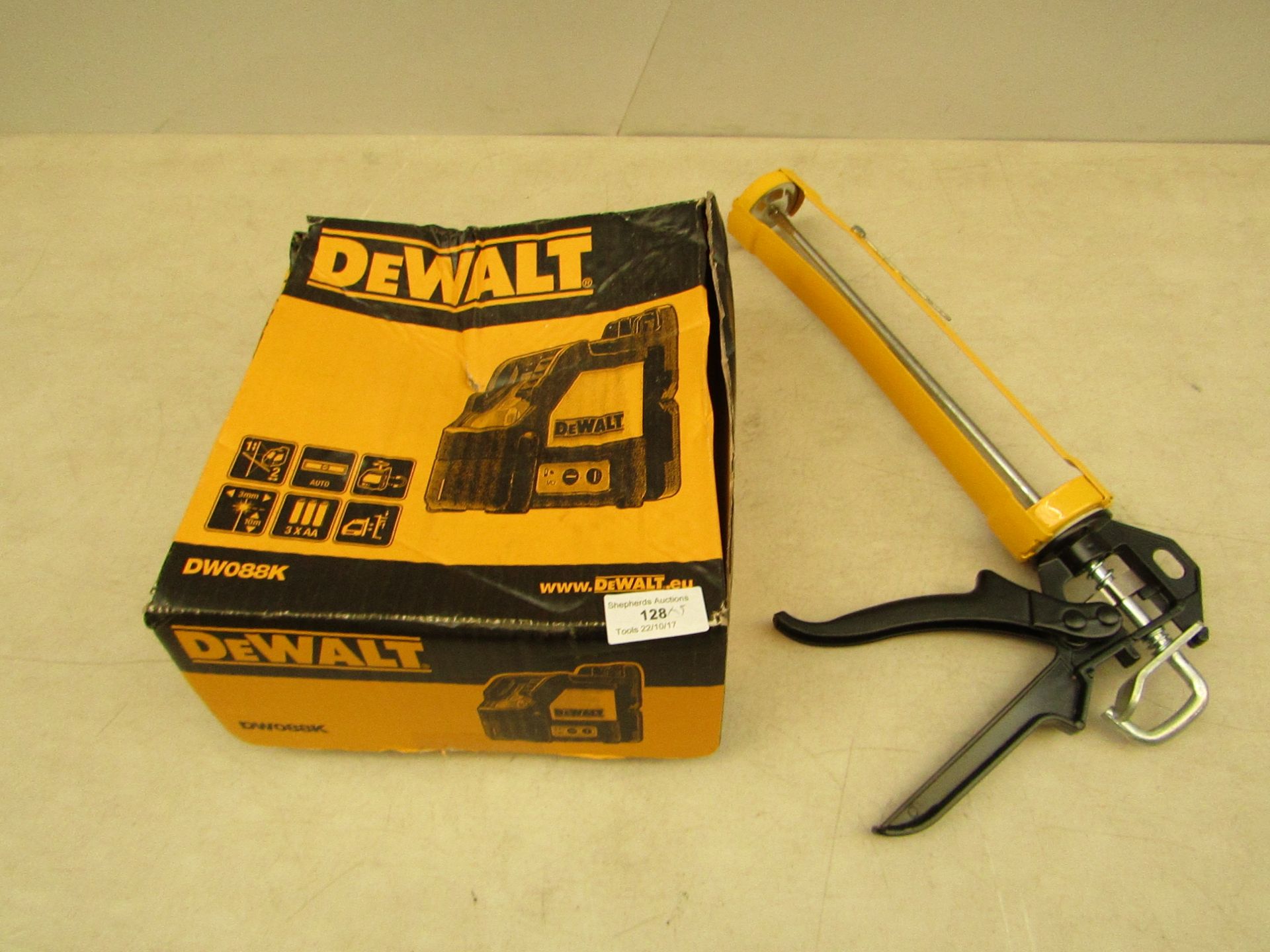 5 items being; DeWalt DW88K, unchecked and boxed. 4x Diall professional dripless sealant guns, all