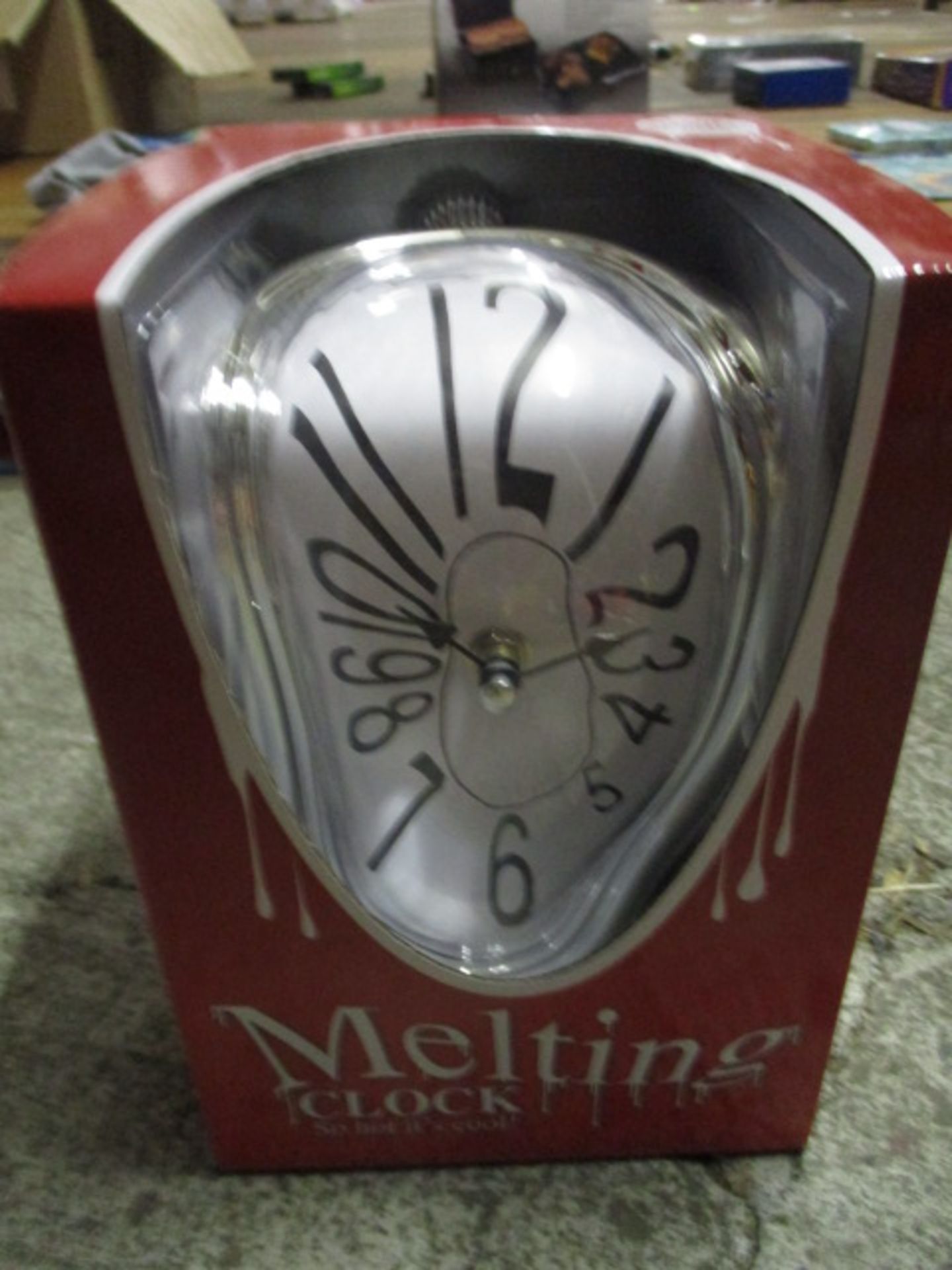 Brand new boxed melting novelty clock