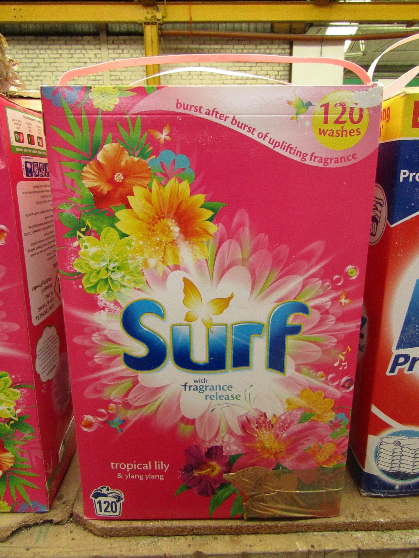 Surf tropical lily & ylang ylang washing powder, good for 120 washes. slight damaged Boxing.