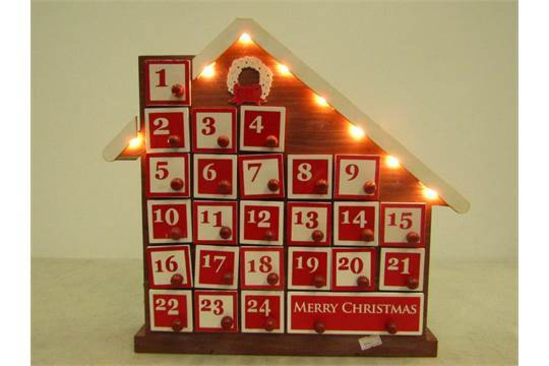 Light up Wooden Advent Calendar with draws on each day, boxed and unchecked.