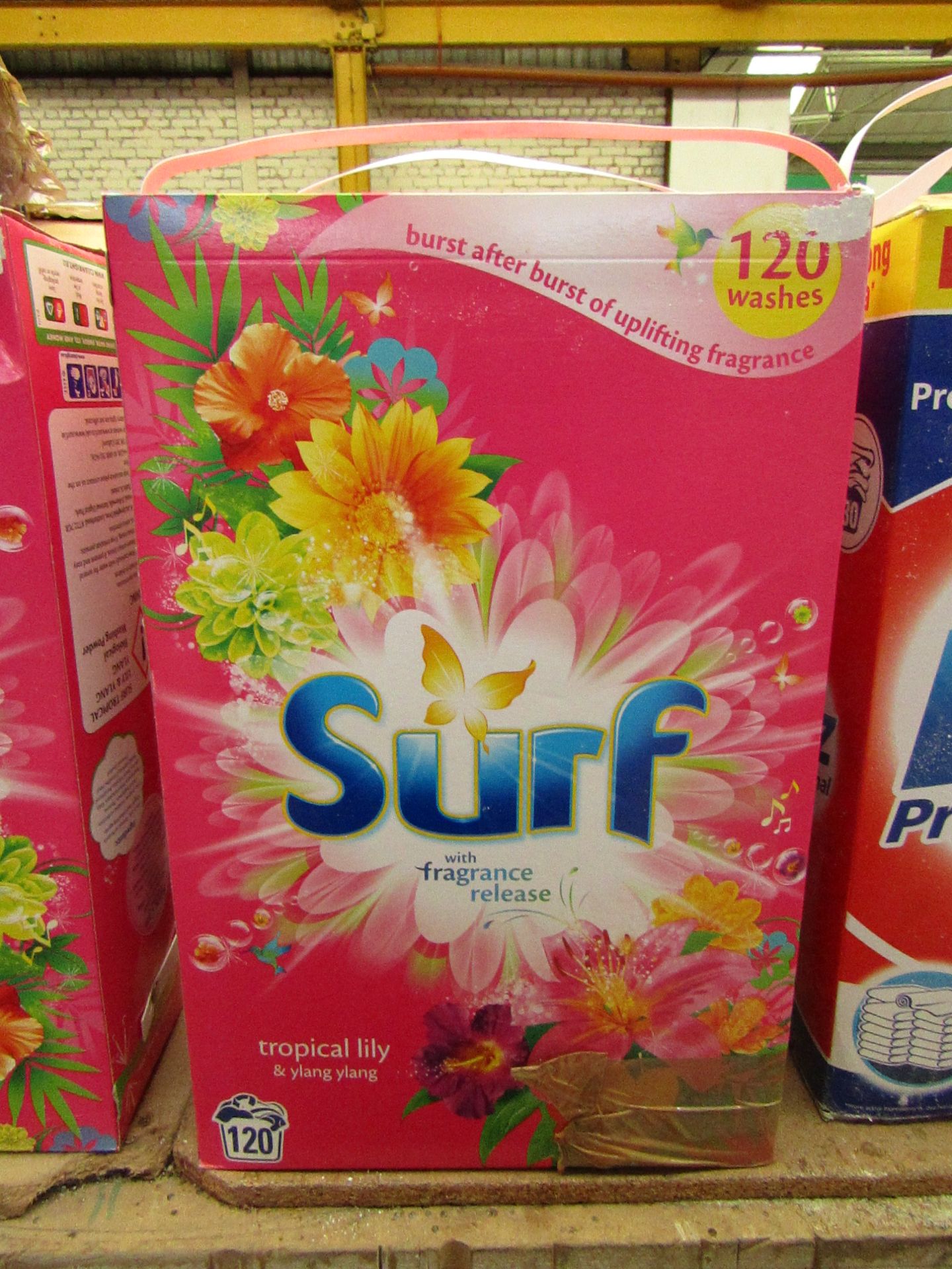 Surf tropical lily & ylang ylang washing powder, good for 120 washes. slight damaged Boxing.