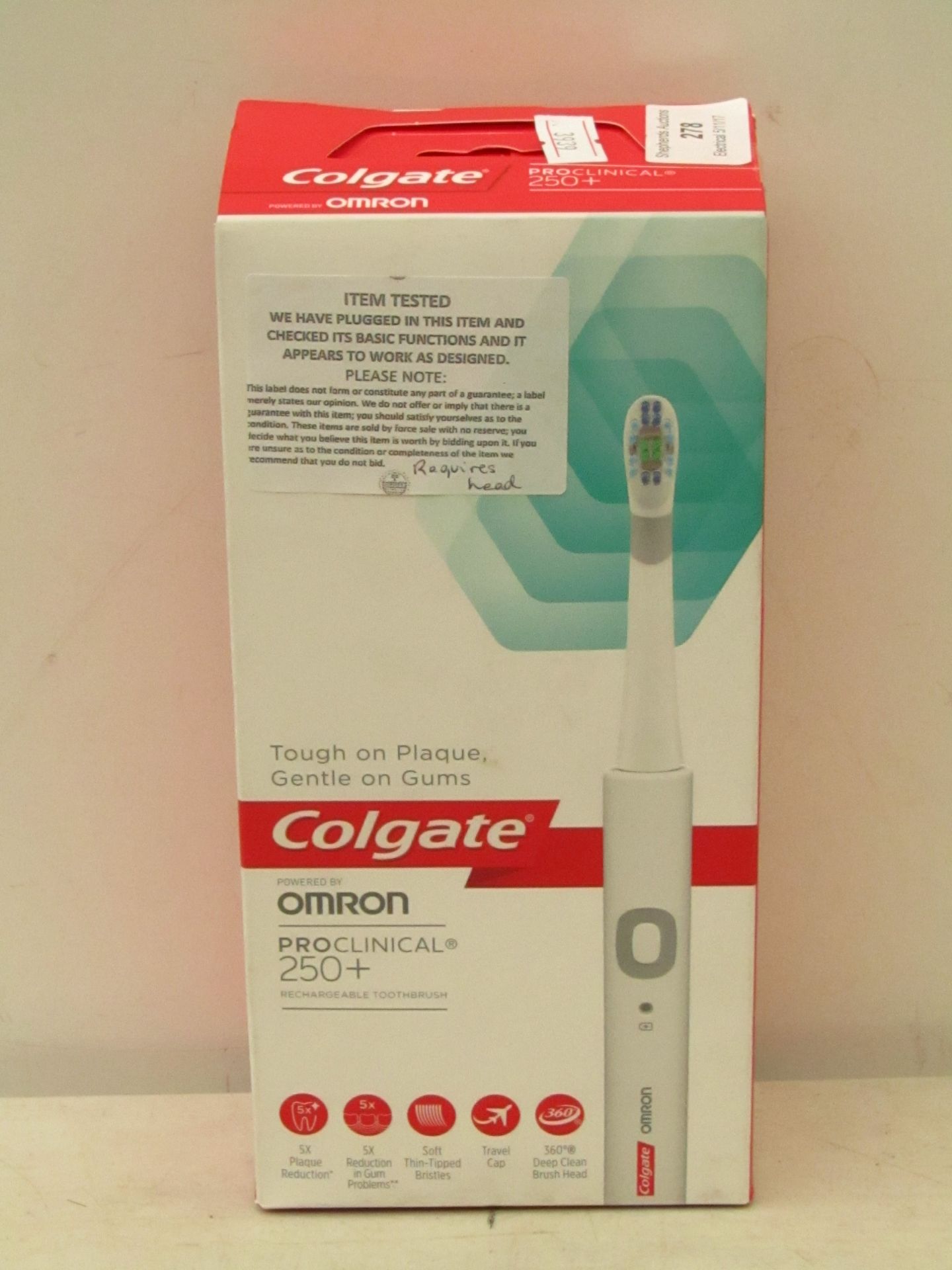Colgate Omron ProClinical rechargeable toothbrush, tested working but requires head. Boxed.