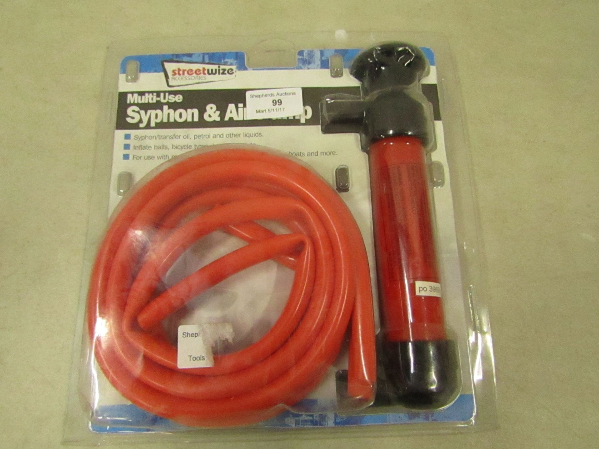 Multi use syphon and air pump, packaged.
