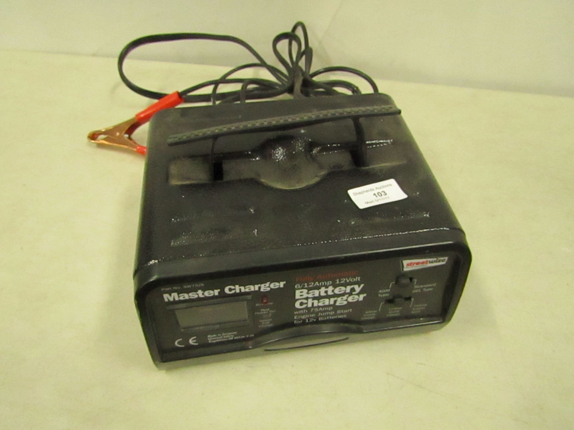 Master charger fully automatic 6/12Amp 12V battery charger. Unchecked.