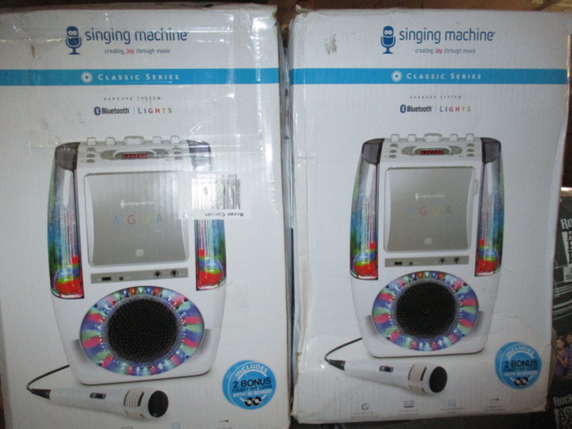 1pc slected from stock at random - Agua Singing Karaoke machine -light and water show return will be