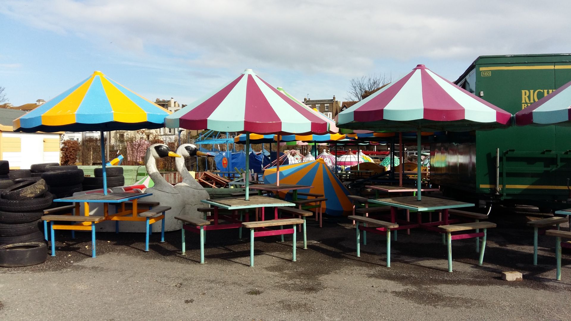 (18) Picnic table and bench sets with fibreglass umbrellas