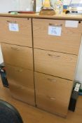 (2) Four drawer light wood effect filing cabinets