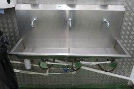 Knee operated three station stainless steel hand sink - A lift out charge will apply