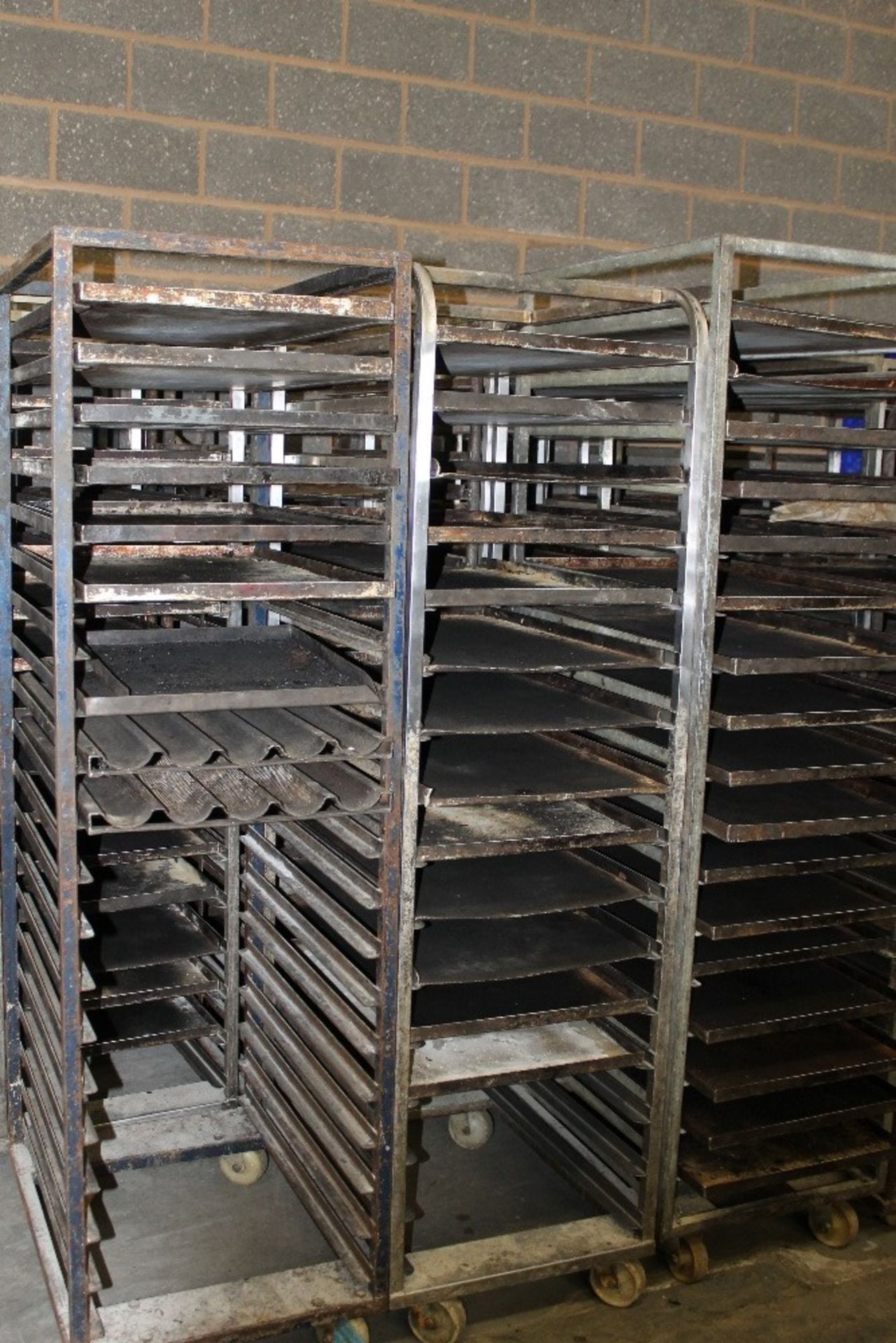 7 x Bakery Racks + some steel 30” x 18” baking trays + French Stick Trays Collect from Alcester ,