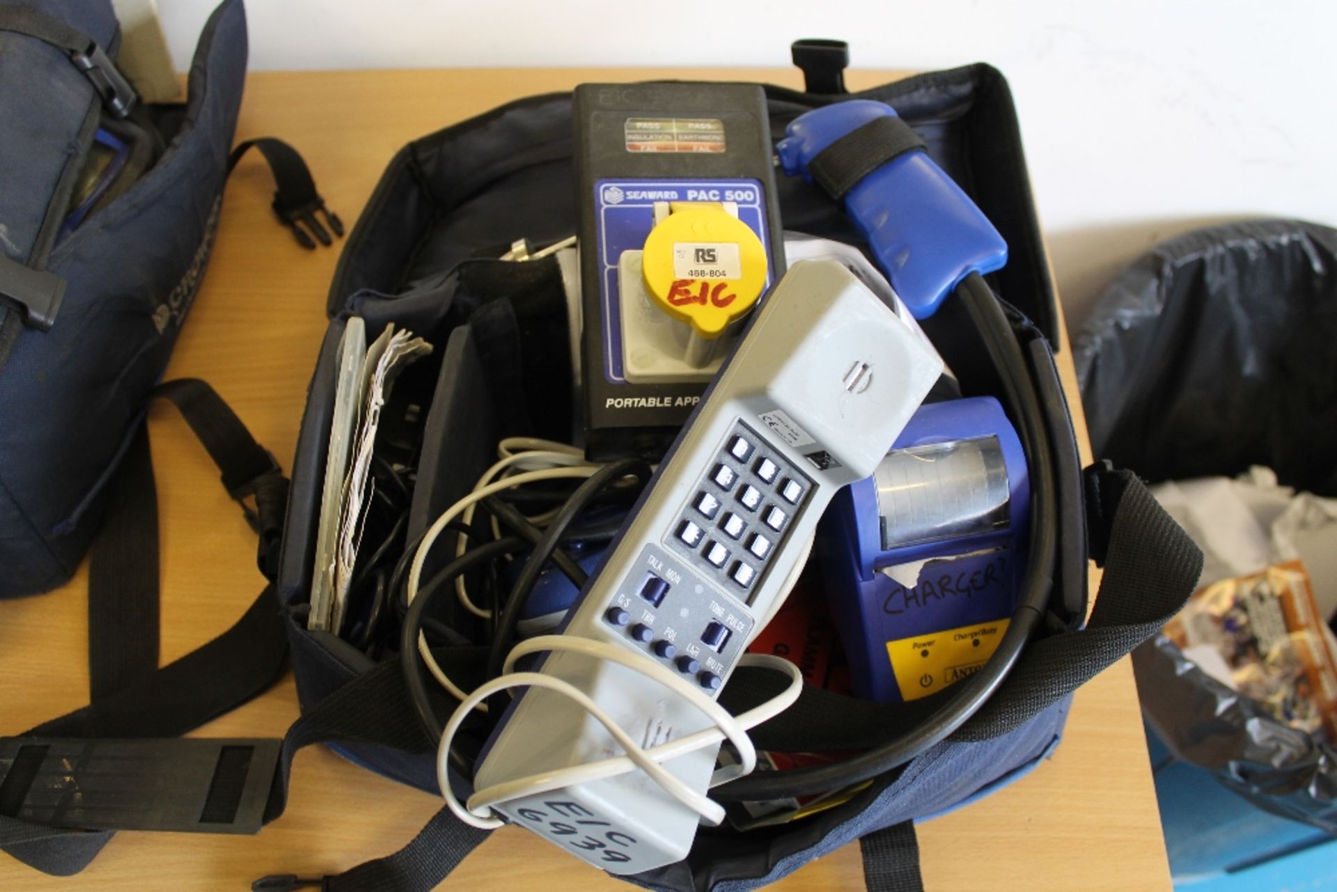 Bag Containing Seaward PAC500 Appliance Checker + Anton Charger + other electrical testing items – - Image 3 of 3