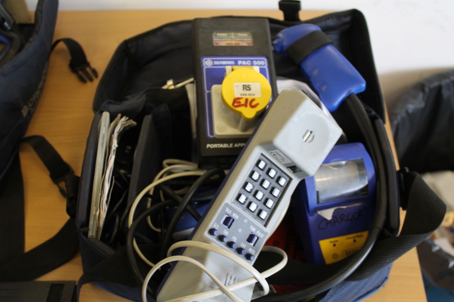 Bag Containing Seaward PAC500 Appliance Checker + Anton Charger + other electrical testing items –