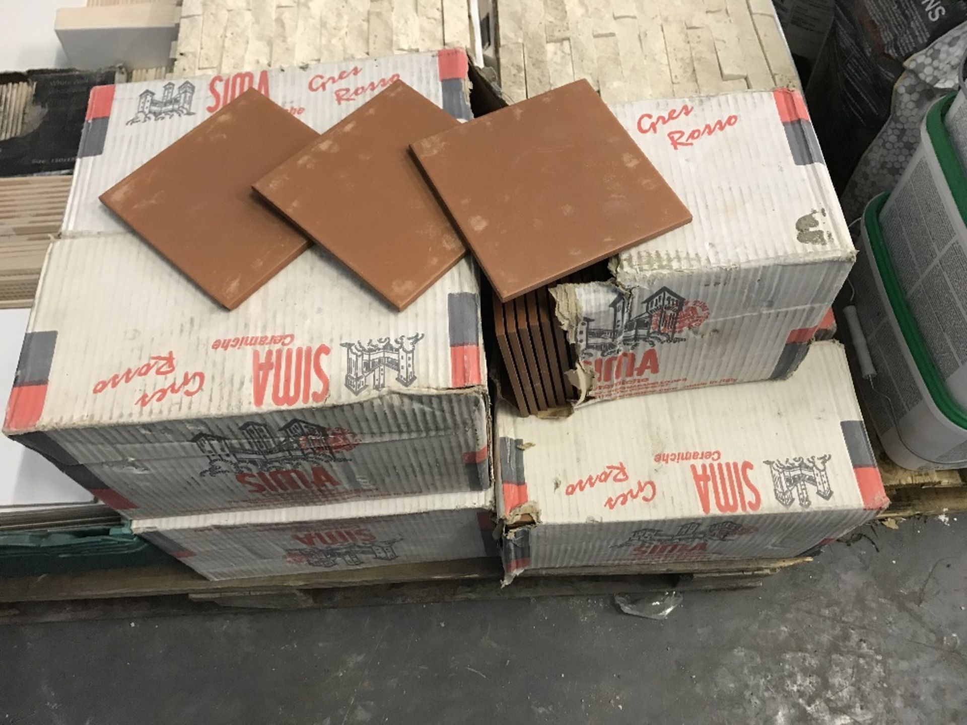 4 boxes of stone coloured tiles