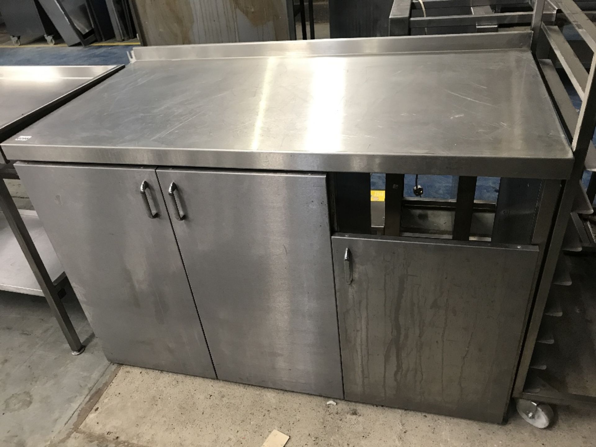 Stainless Steel prep unit with 2 door cupboard and enclosed space with access for bin W1400 x D750