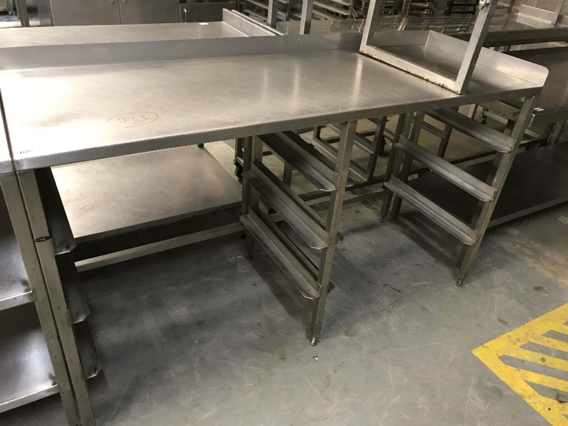 Corner wall prep table with upstand on back and side with tray rack ideal for bakery style trays