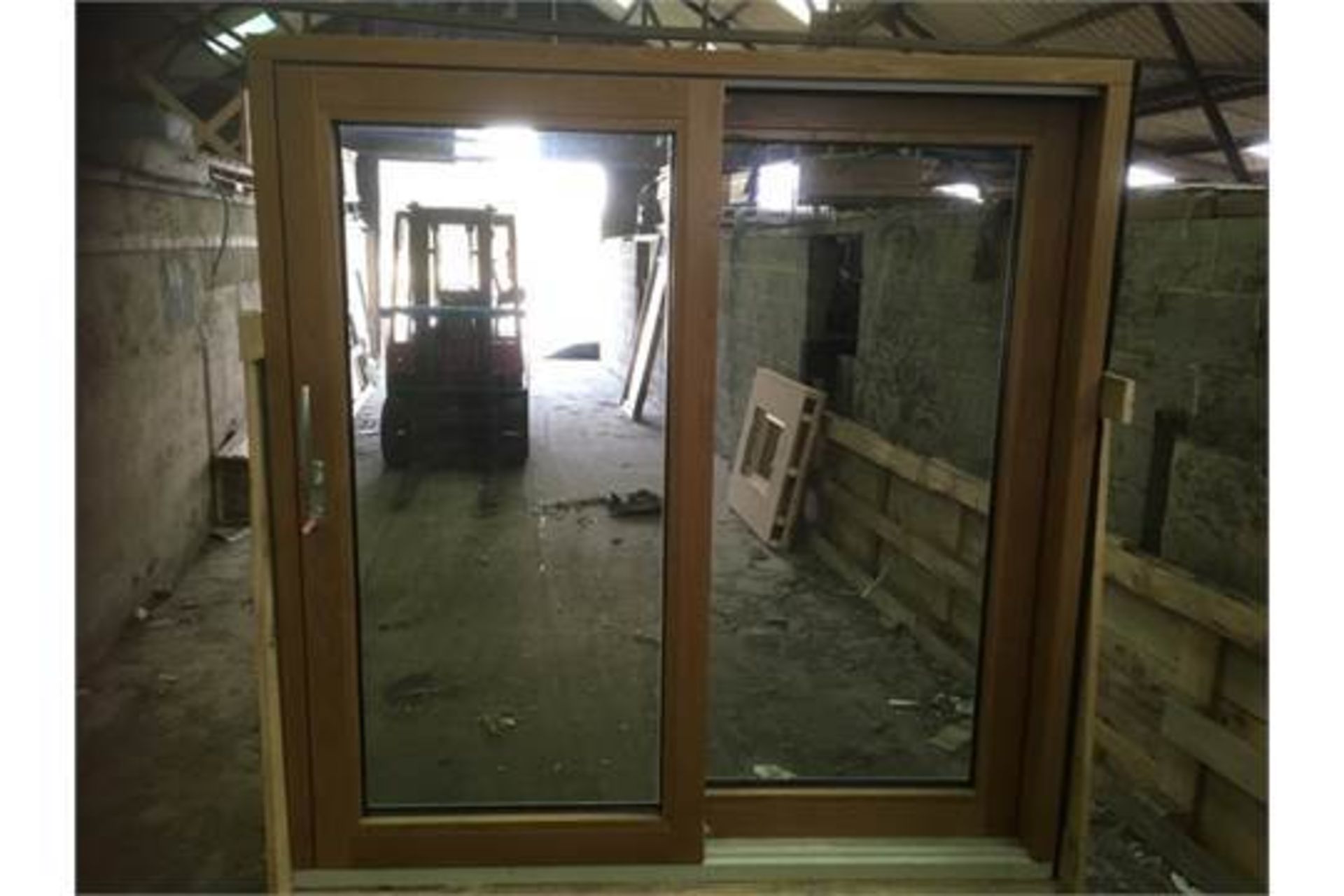 Unilux Triple Glazed Lift Slide Door – NO VAT Inside View – Oak clear finish – Outside View –