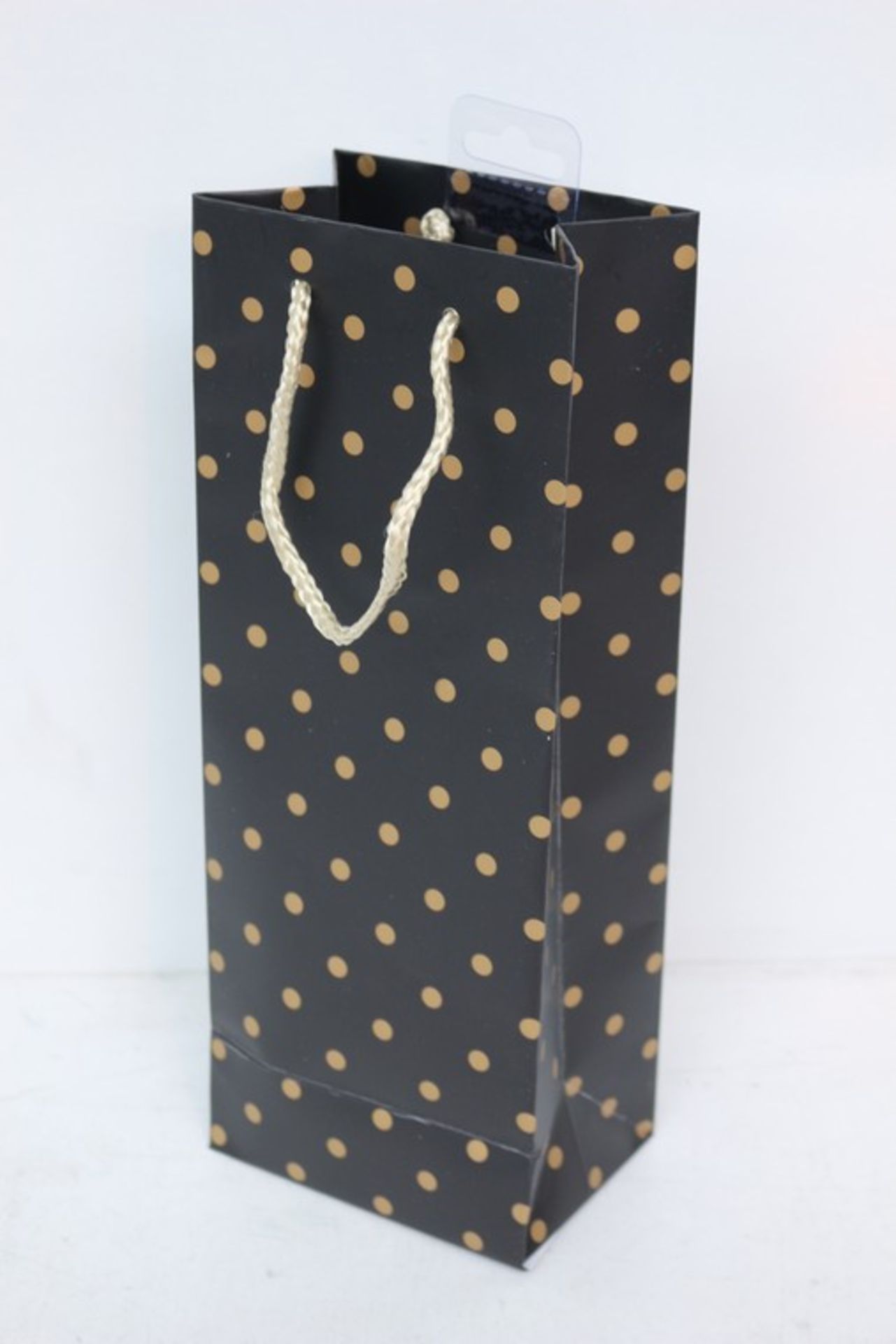 5 x BAGS EACH CONTAINING 12 BLACK BOTTLE BAGS WITH GOLD POLKA DOTS *PLEASE NOTE THAT THE BID PRICE