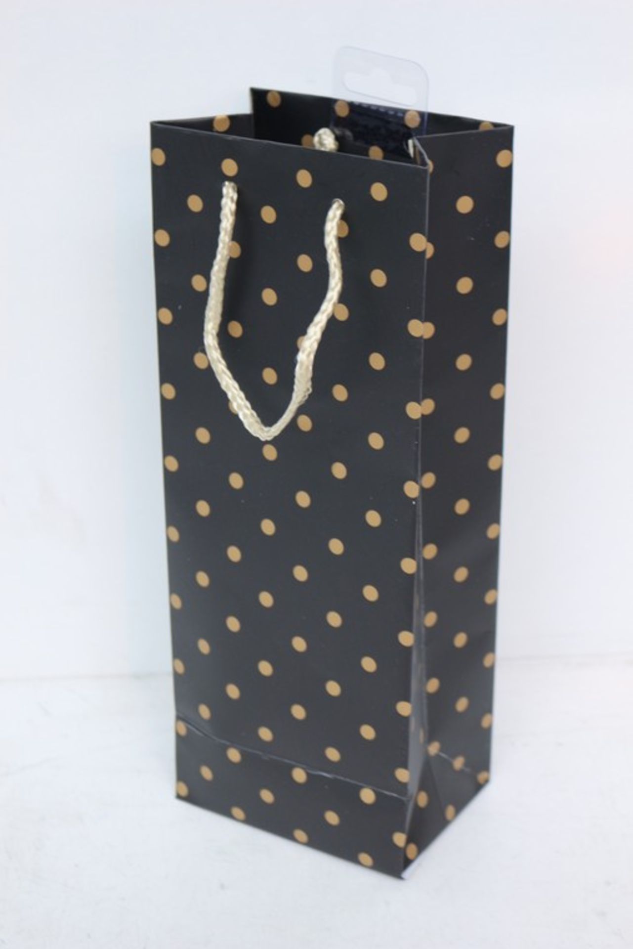 5 x BAGS EACH CONTAINING 12 BLACK BOTTLE BAGS WITH GOLD POLKA DOTS *PLEASE NOTE THAT THE BID PRICE