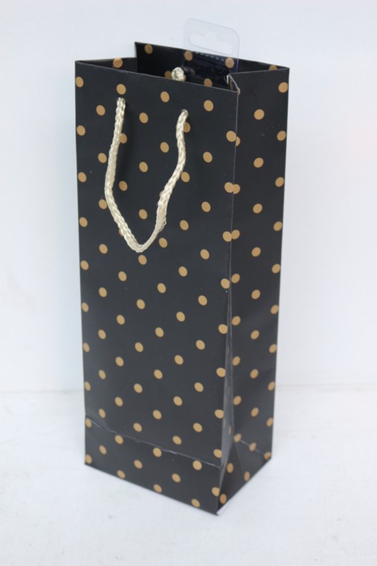 5 x BAGS EACH CONTAINING 12 BLACK BOTTLE BAGS WITH GOLD POLKA DOTS *PLEASE NOTE THAT THE BID PRICE