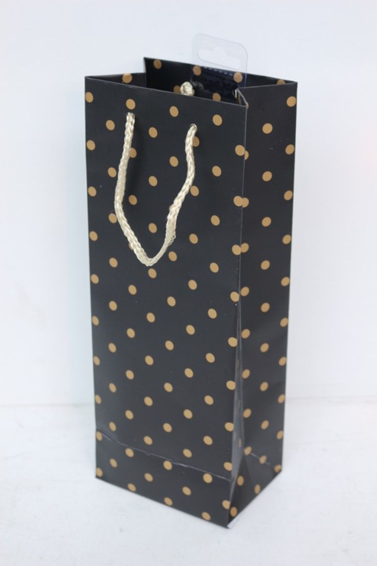5 x BAGS EACH CONTAINING 12 BLACK BOTTLE BAGS WITH GOLD POLKA DOTS *PLEASE NOTE THAT THE BID PRICE