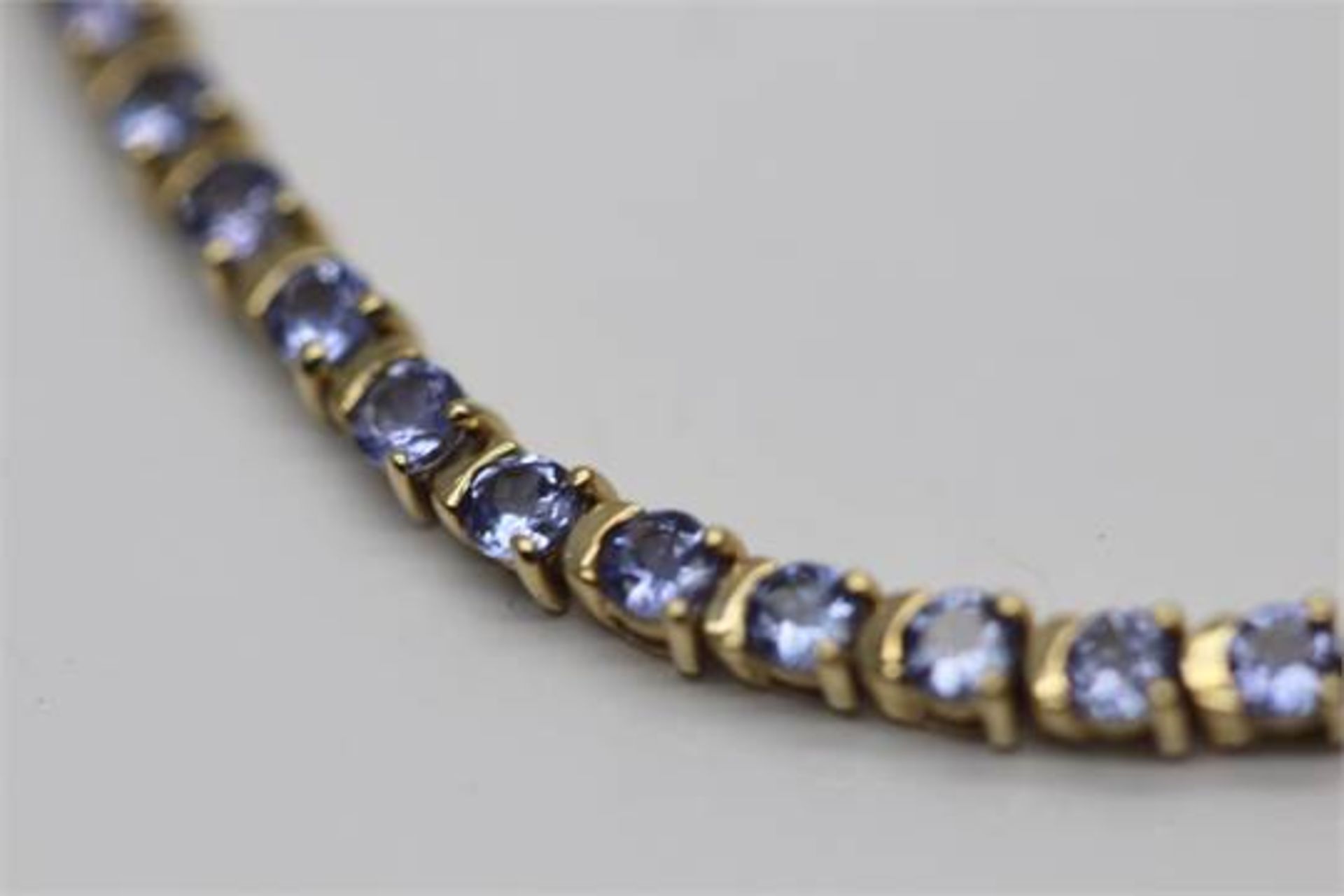 5.20 CARATS INTENSE BLUE NATURAL TANZANITE SOLID YELLOW GOLD LADIES TENNIS BRACELET (PV-JH)