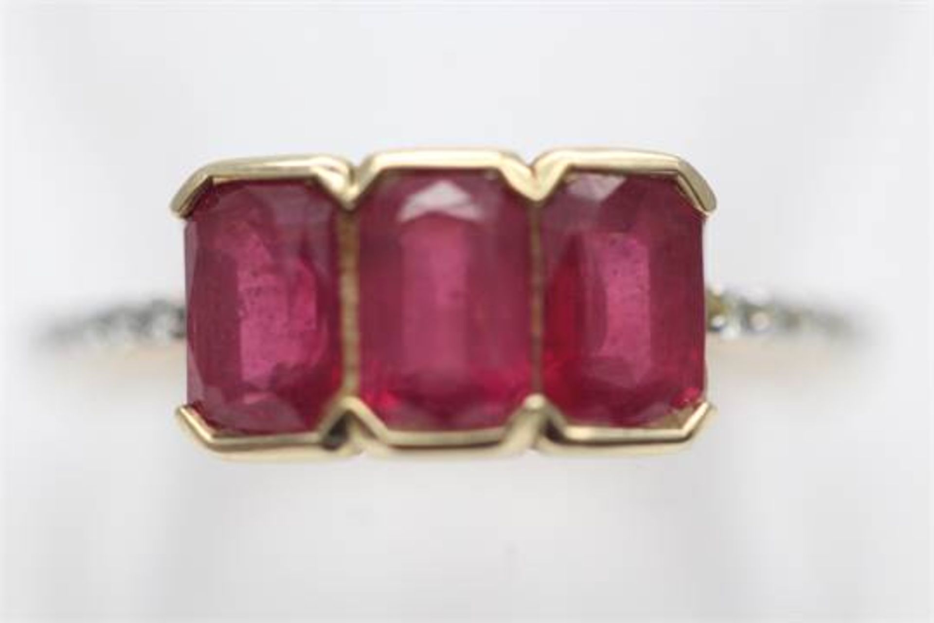 SOLID YELLOW GOLD LADIES RING SET WITH 2.40 CARATS NATURAL RUBY WITH DIAMONDS ALONG SIDE (PV-JH)