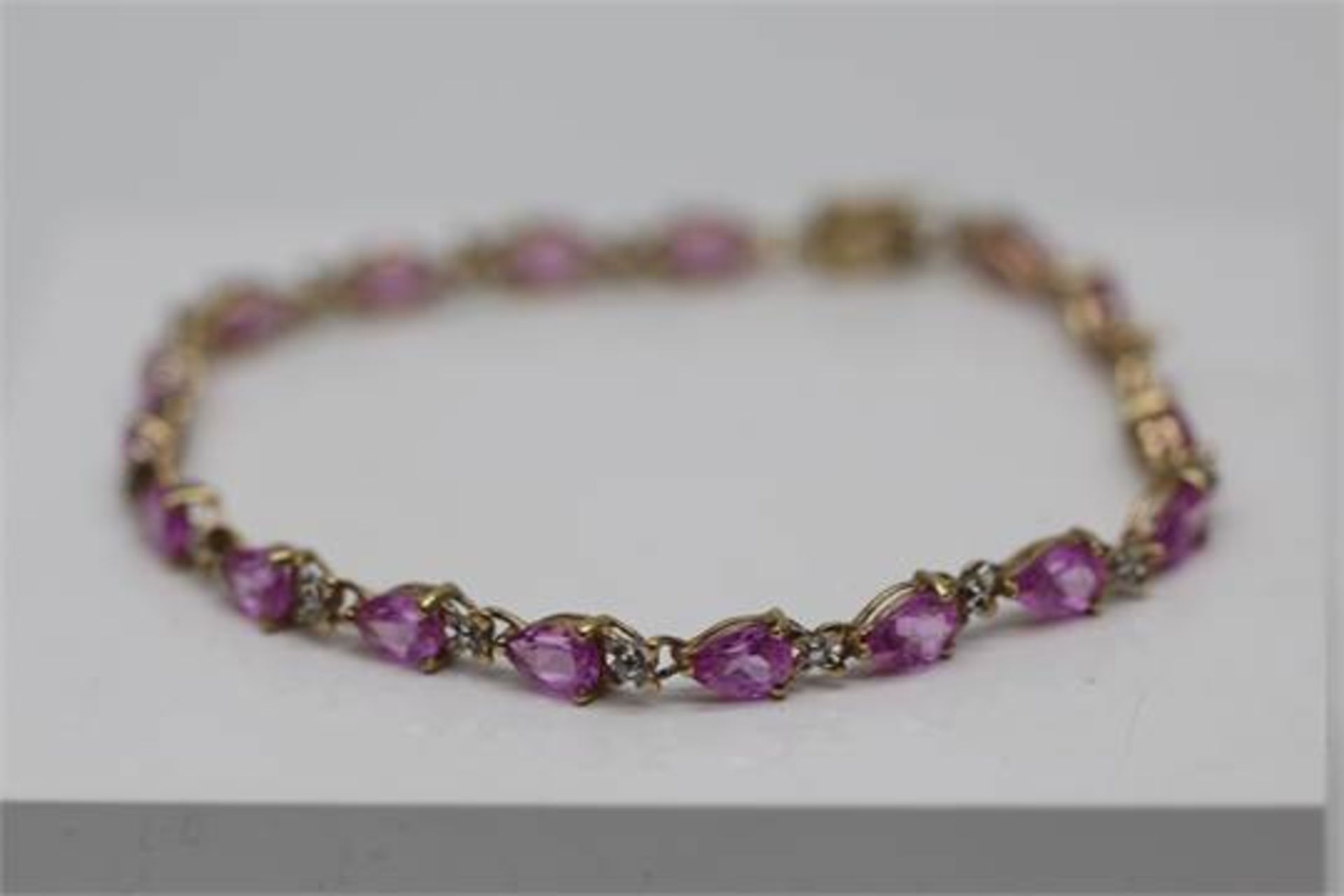 34.00 CARAT NATURAL PINK SAPPHIRES AND DIAMONDS LADIES BRACELET SET IN YELLOW GOLD (PV-JH)