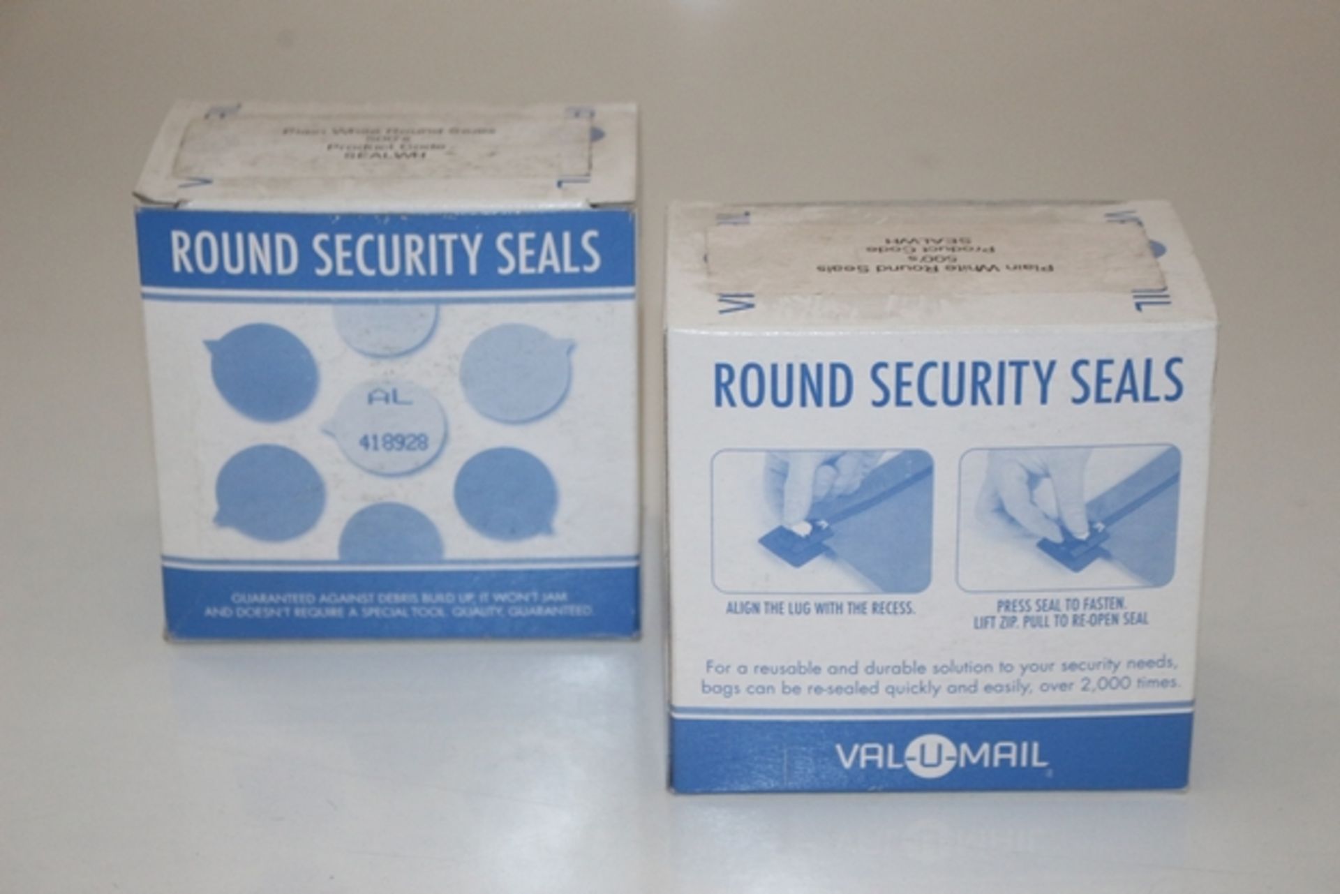 1X LOT TO CONTAIN 47 BOXES OF ROUND SECURITY SEALS (110) (AC-ROCK)