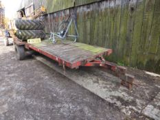 Red flat bed trailer