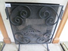 Wrought iron fire screen
