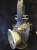 Black/brass British Rail lamp stamped BR (M) with round front lens and three internal coloured