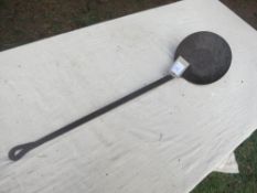 Long-handled iron ladle