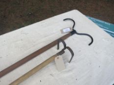 Shepherd's dipping crook and 1 other tool