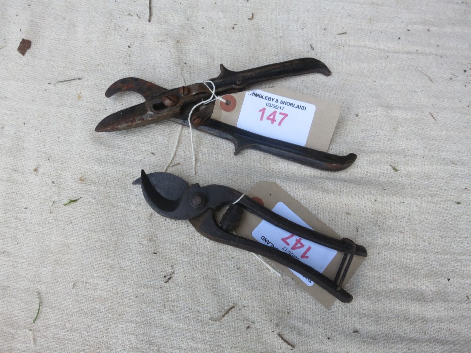An early pair of Wilkinson Sword secateurs and 1 other